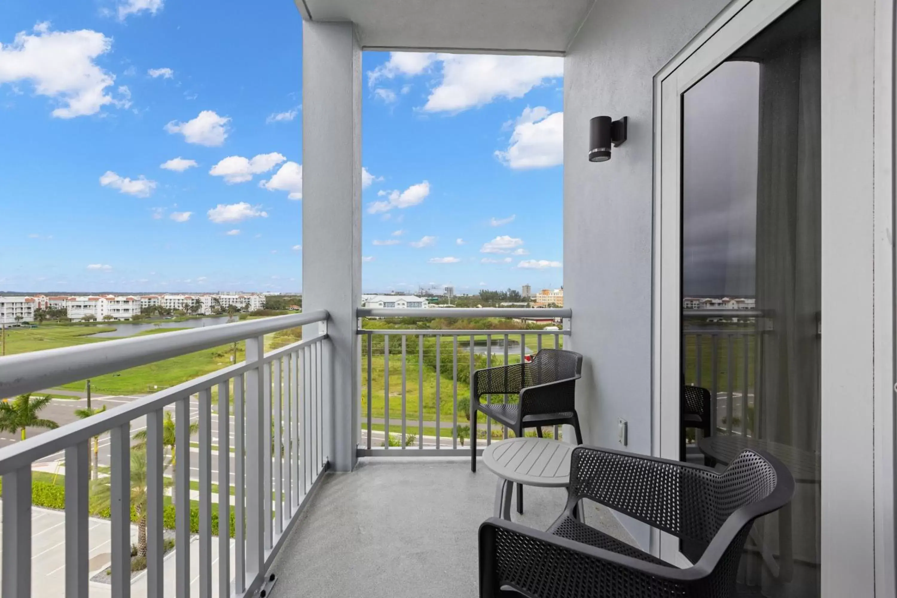 Bedroom, Balcony/Terrace in TownePlace Suites by Marriott Cape Canaveral Cocoa Beach