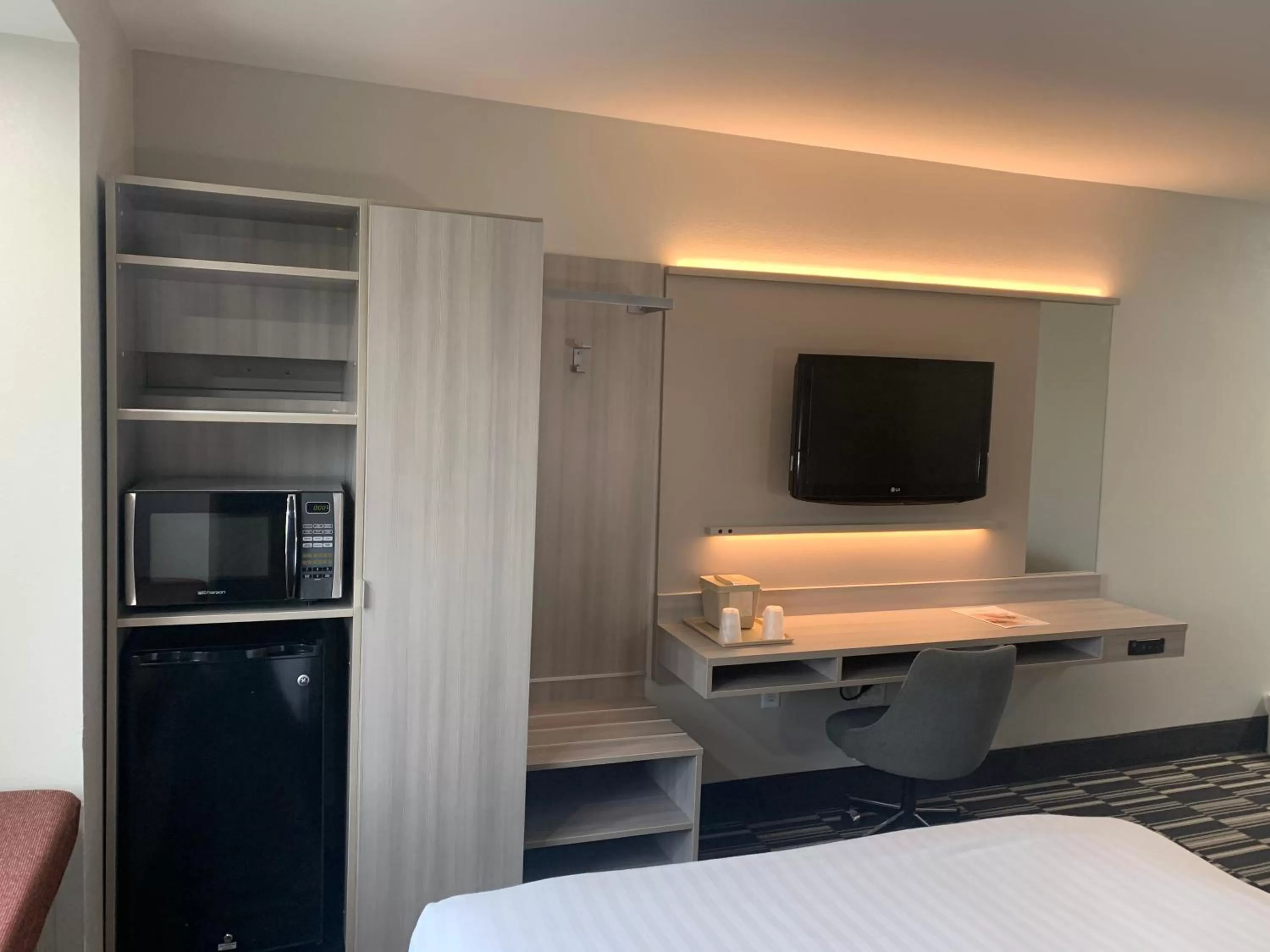 Bed in Microtel Inn by Wyndham Charlotte Airport