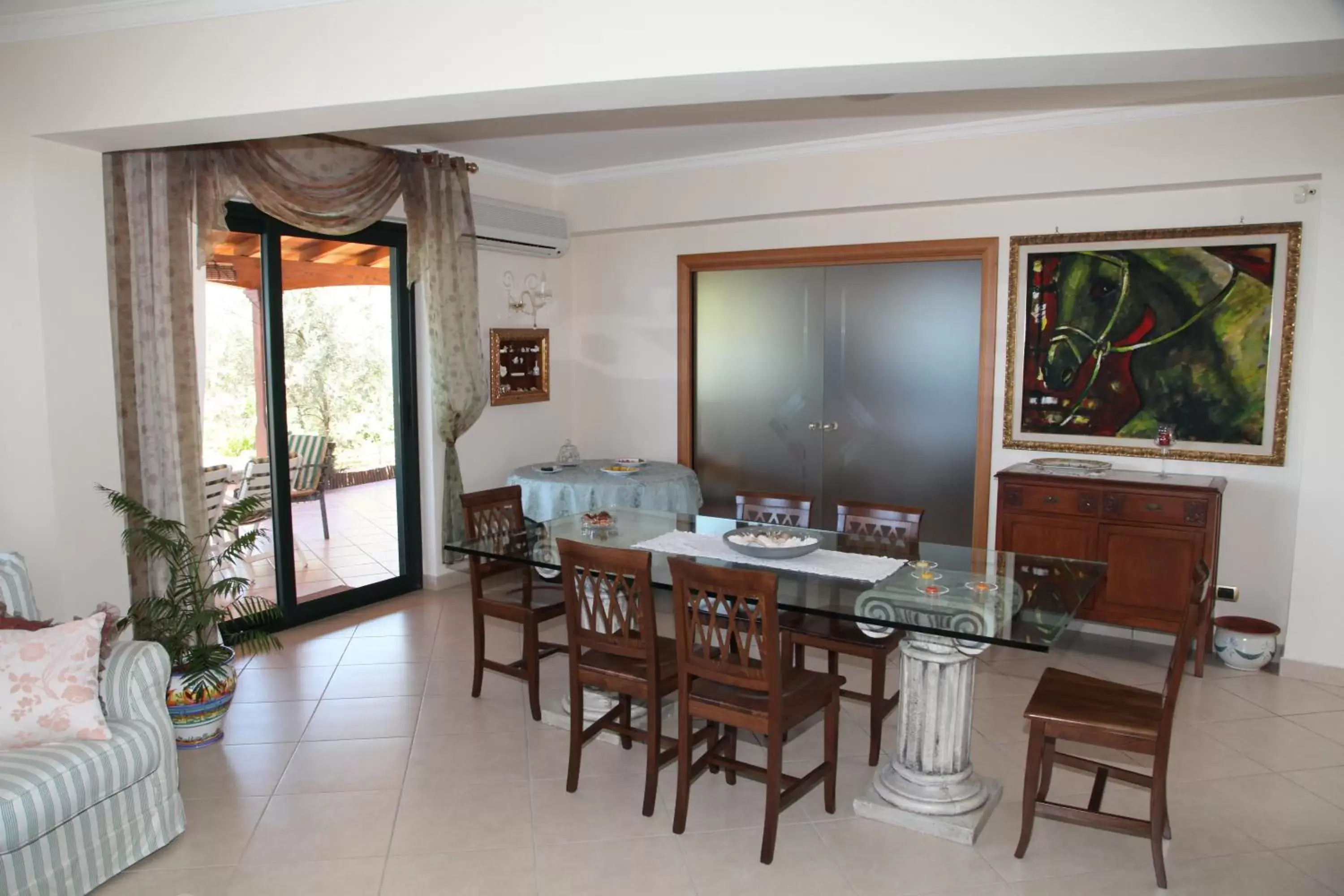 Communal lounge/ TV room, Dining Area in La Collina Capo d'Orlando