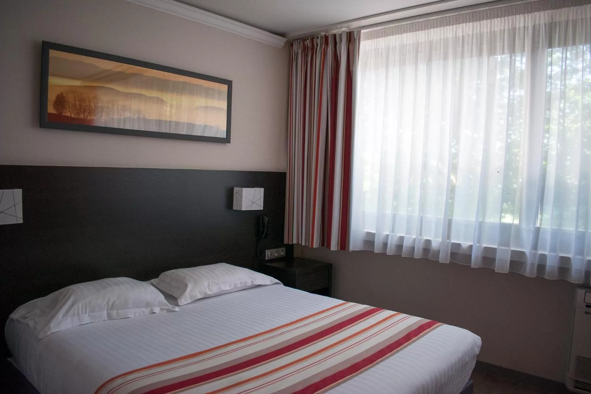 Bedroom, Bed in Logis Hotel Restaurant Black and Green Limoges Sud