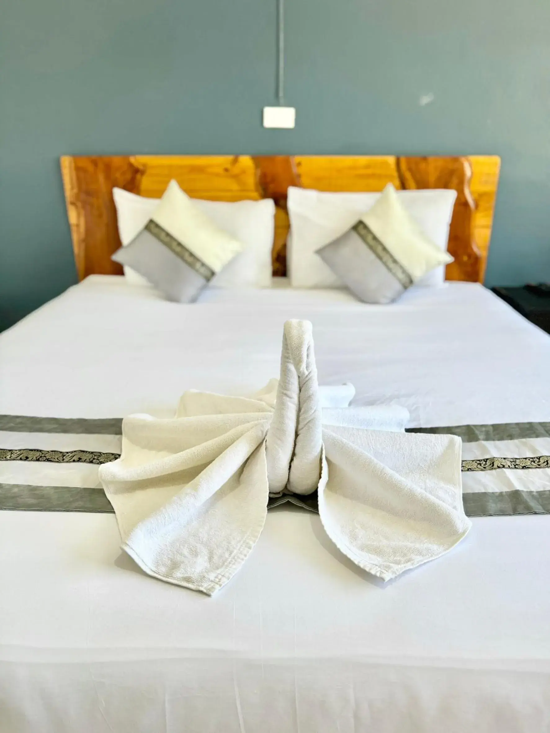 Bed in Diamond De Pai City Hotel