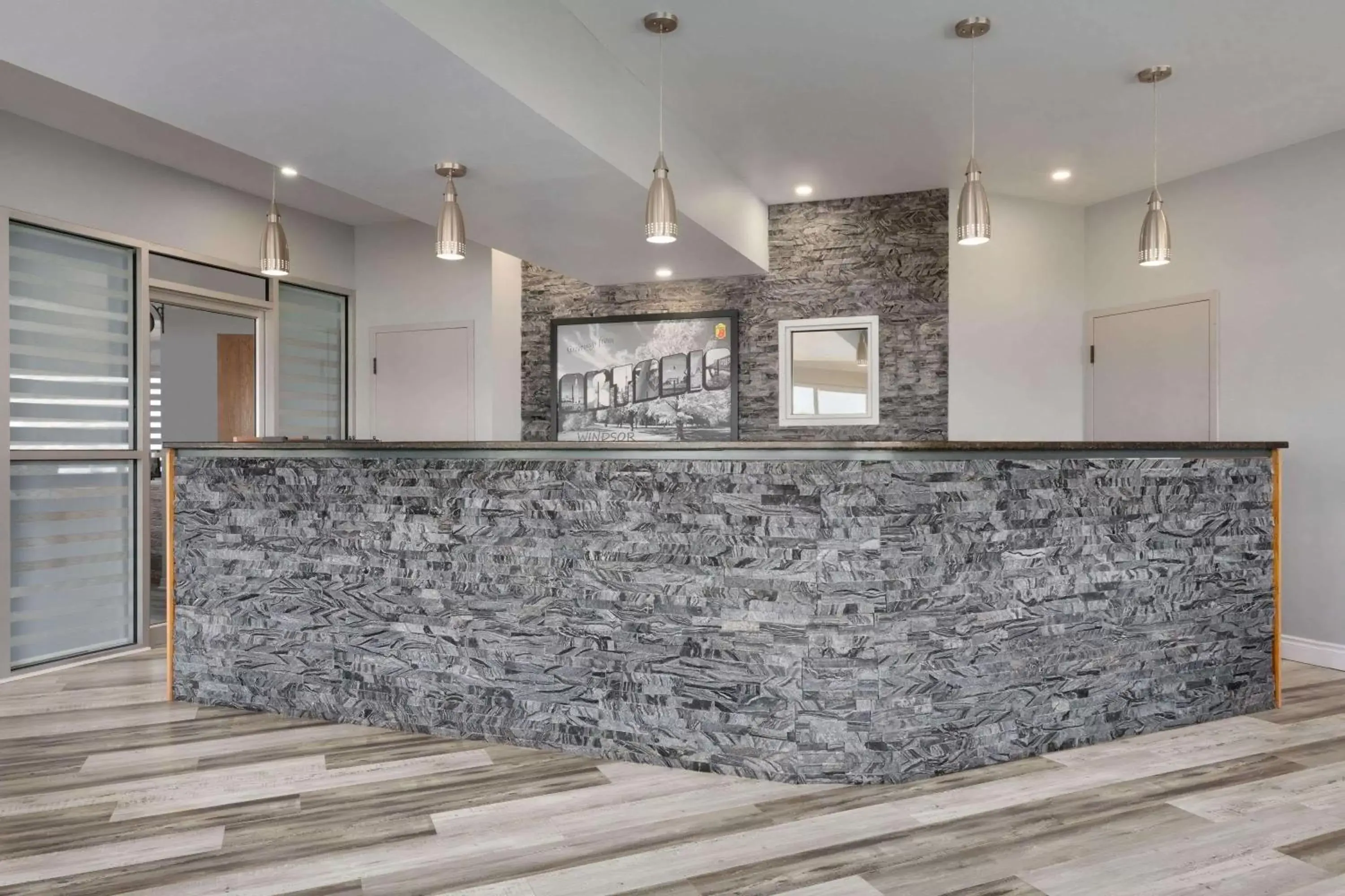 Lobby or reception in Super 8 by Wyndham Windsor/Dougall Lobby or reception in Super 8 by Wyndham Windsor/Dougall