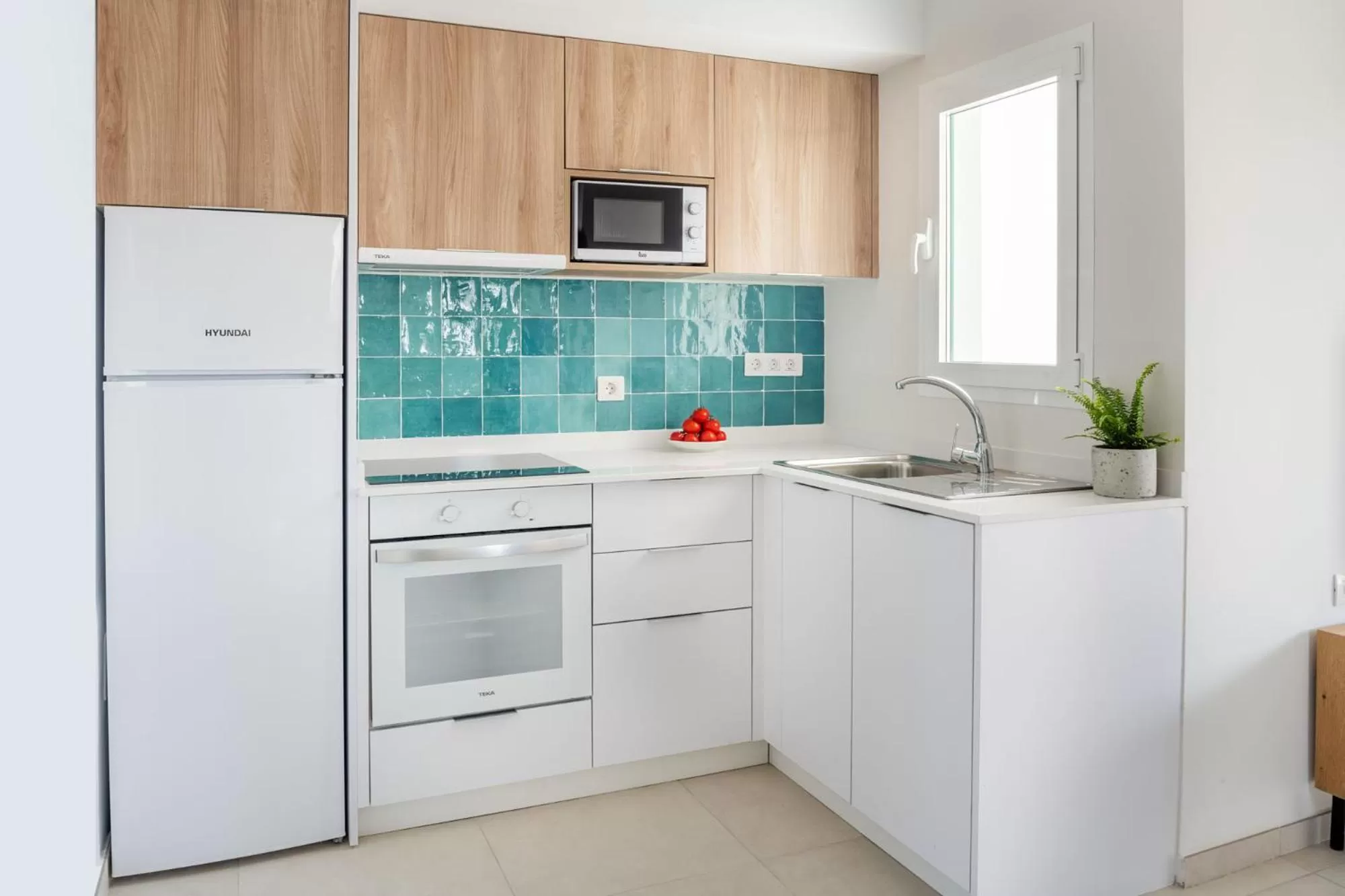 Kitchen or kitchenette in Nazaret Apartments