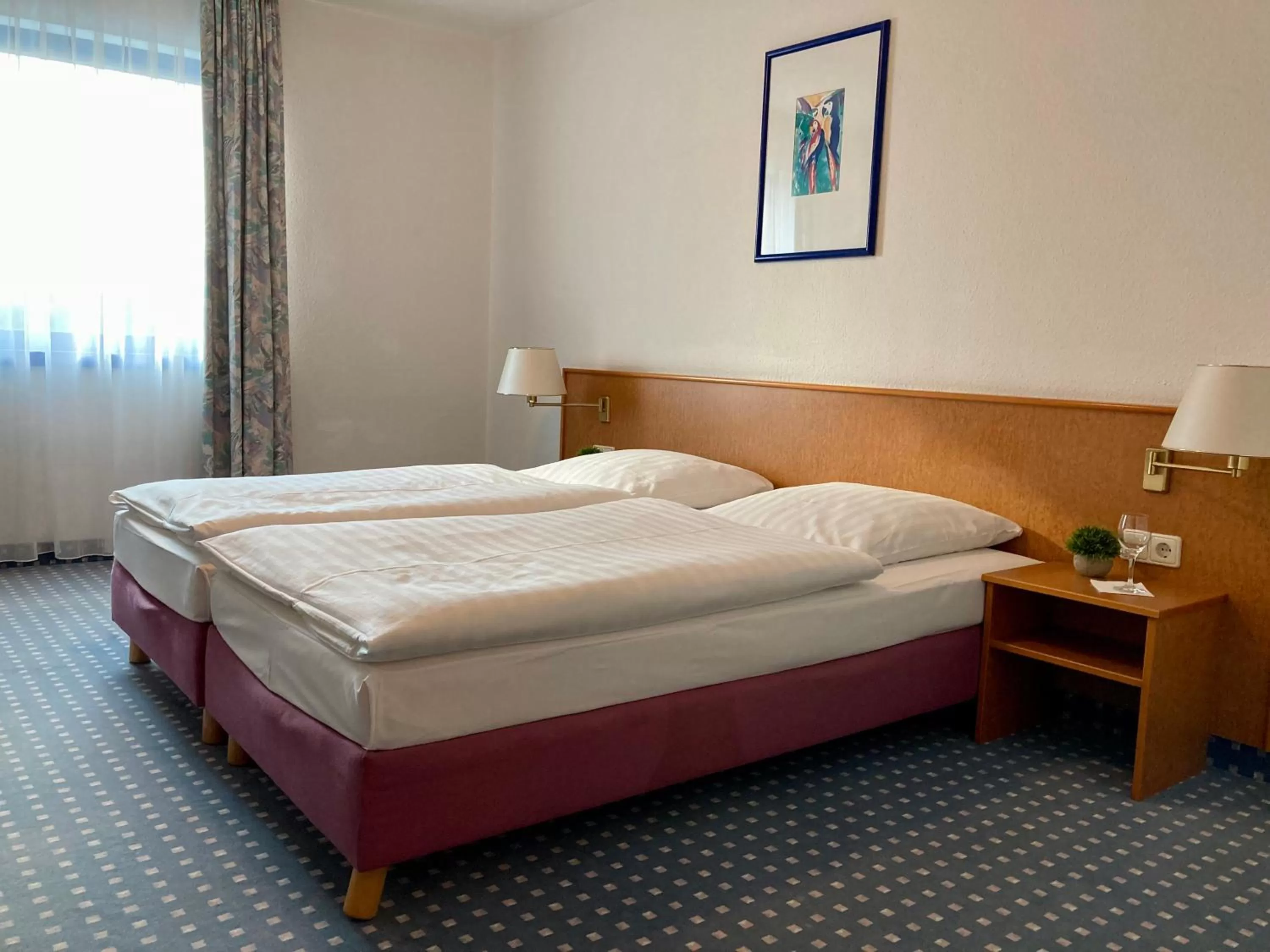 Bed in Akzent Congresshotel Hoyerswerda