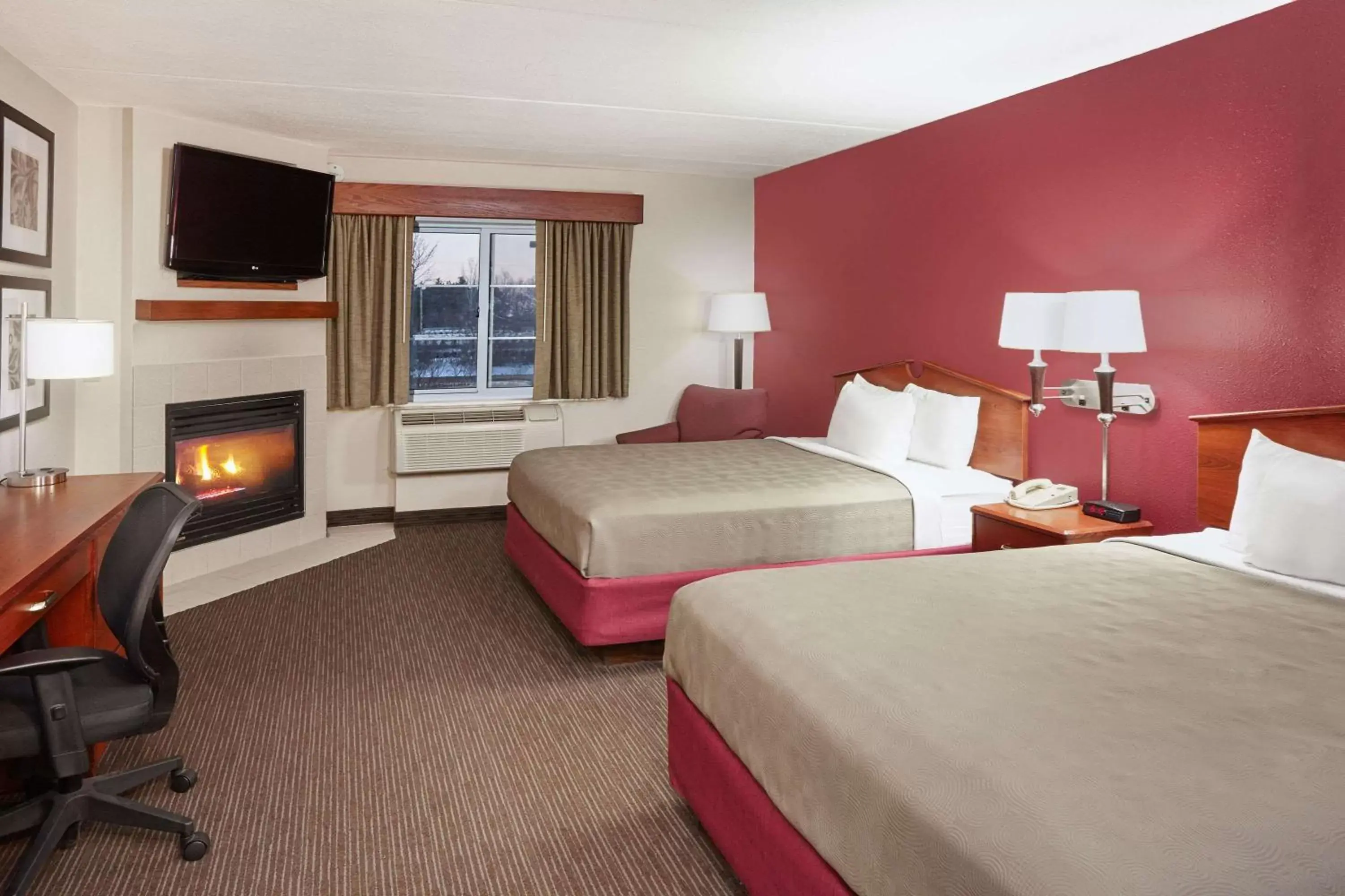 Photo of the whole room in AmericInn by Wyndham Douglas/Saugatuck