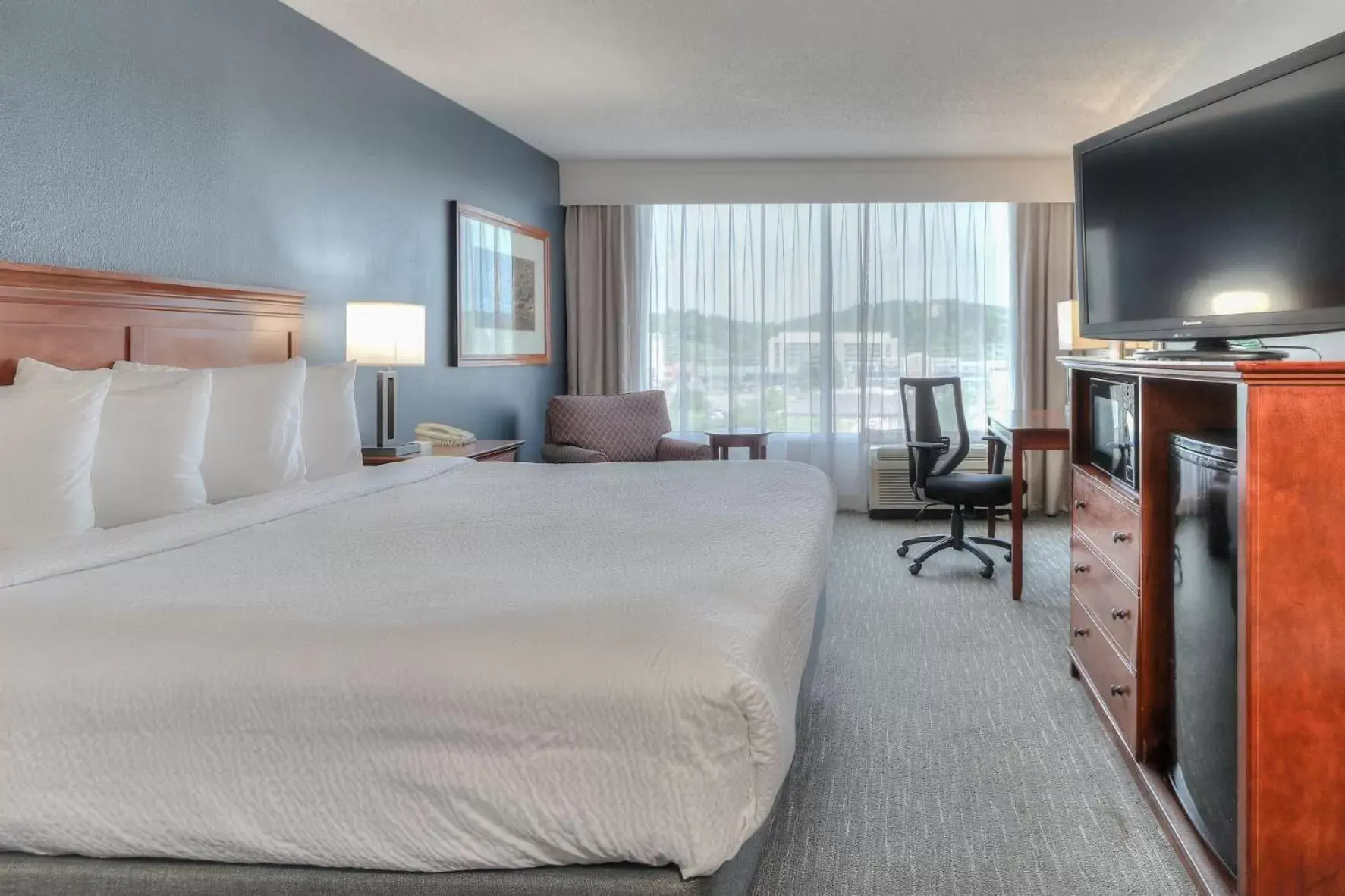 Bed in The Ramsey Hotel and Convention Center Bed in The Ramsey Hotel and Convention Center