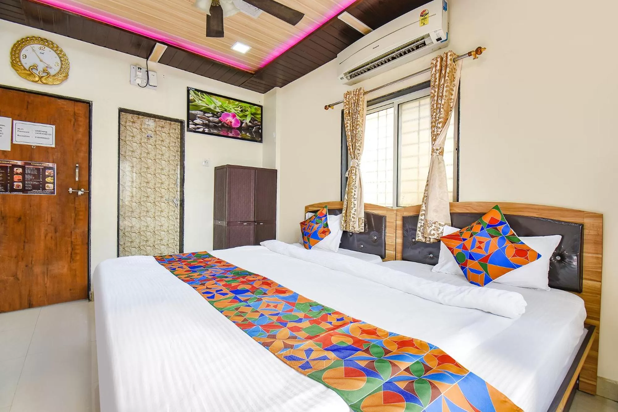 Photo of the whole room, Bed in FabExpress Vardhan Executive