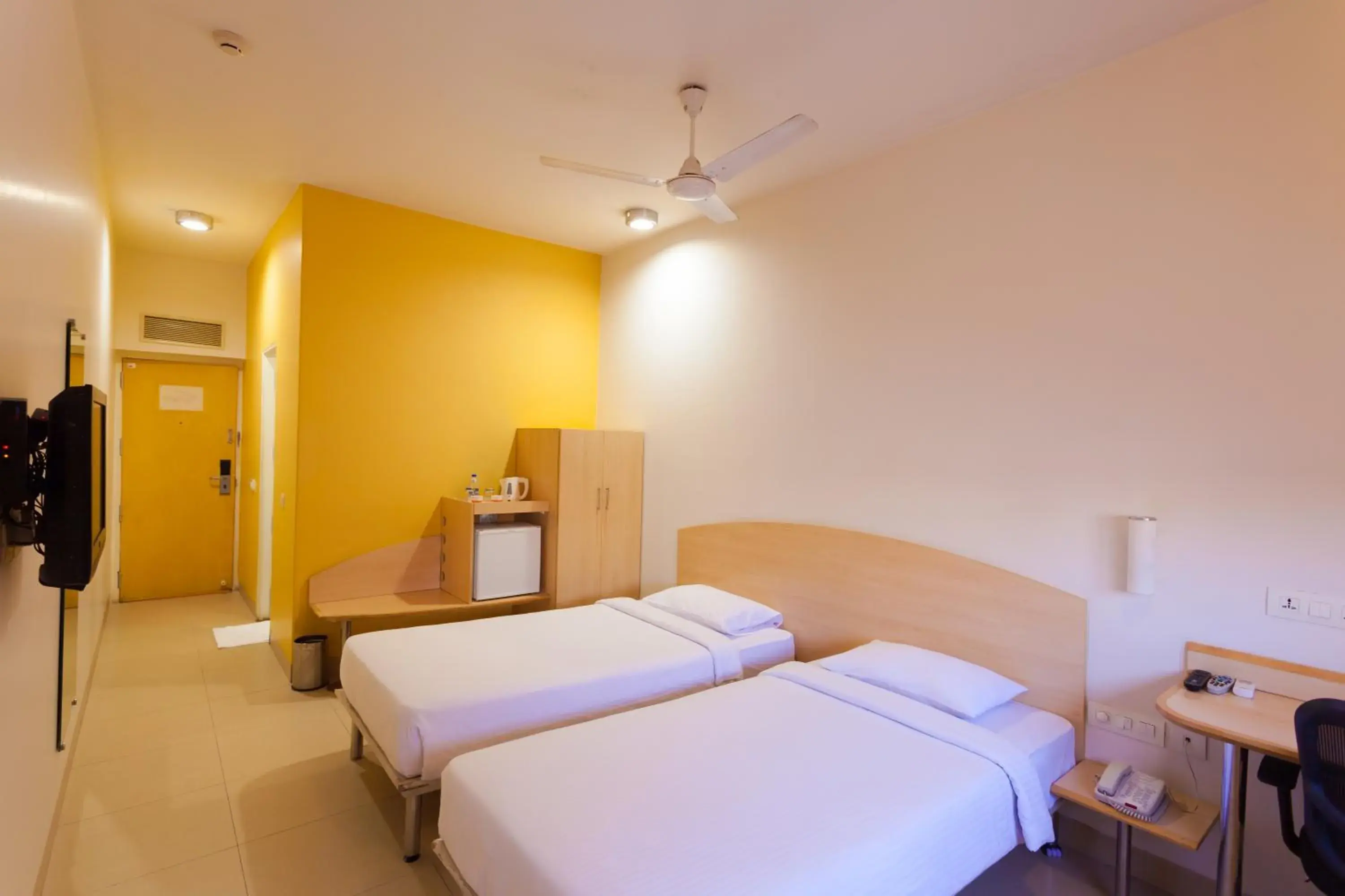 Photo of the whole room, Bed in Ginger Hotel Mangalore