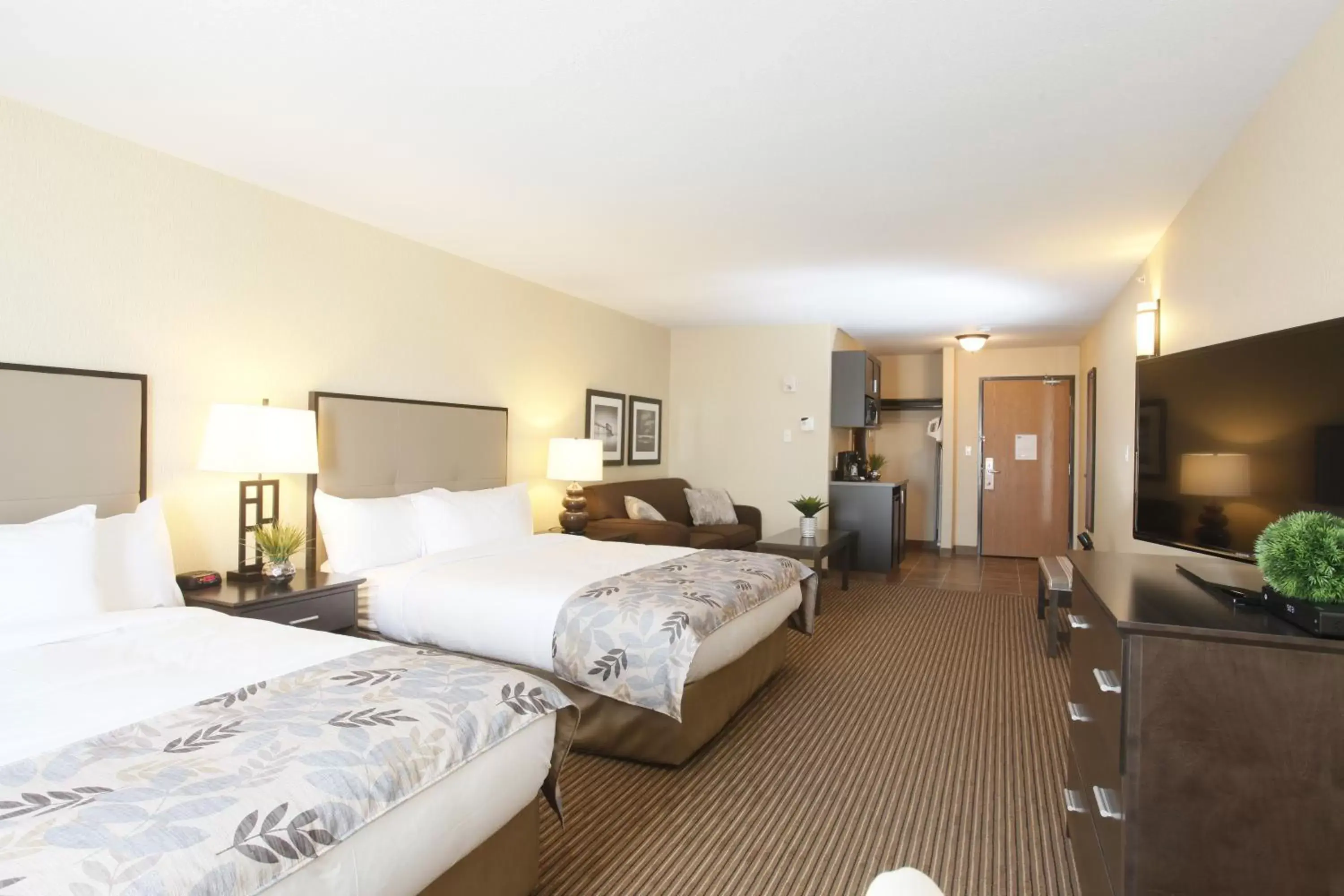 Bedroom in Pomeroy Inn & Suites at Olds College