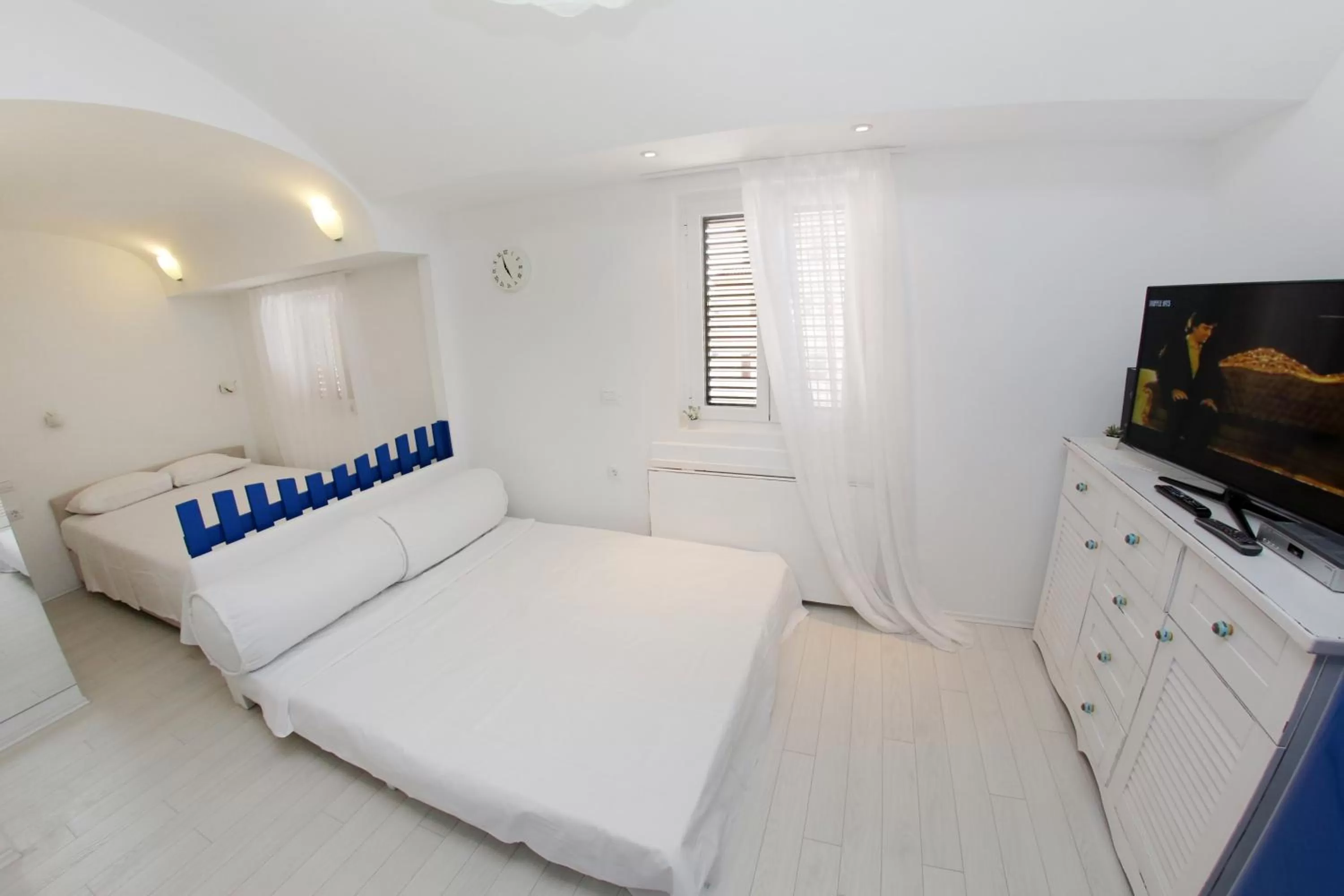 Bed in Central Apartments Integrated Hotel