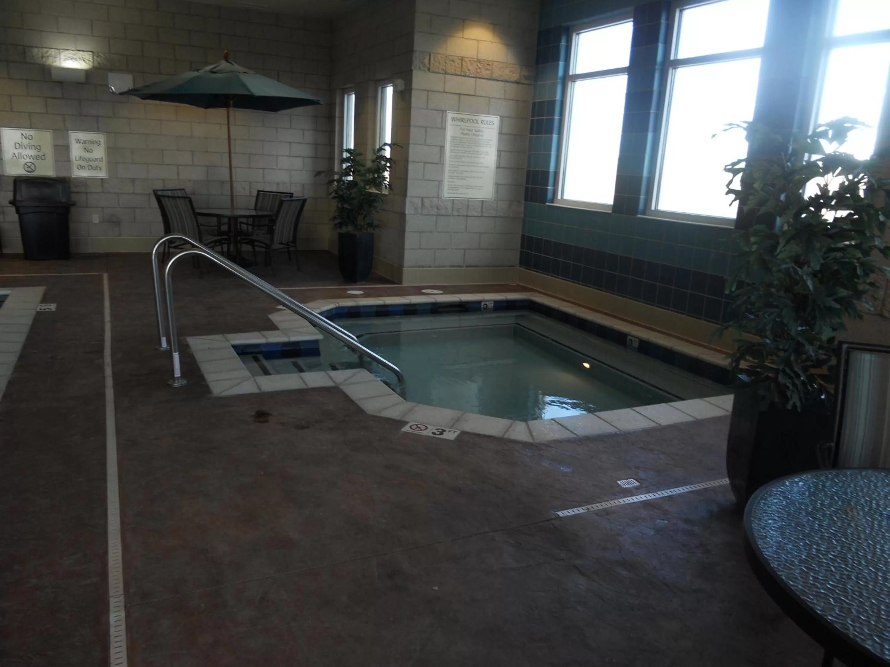 Swimming pool in Hawthorn Extended Stay by Wyndham Dickinson