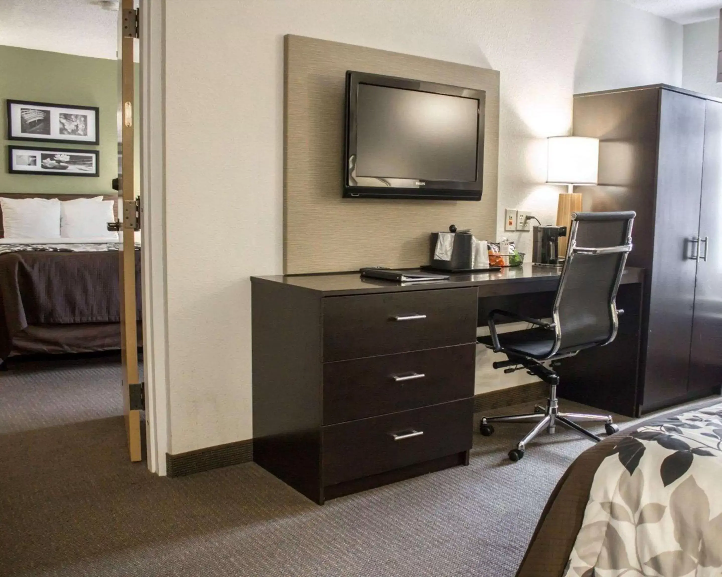 Photo of the whole room, TV/Entertainment Center in Sleep Inn & Suites Columbus State University Area