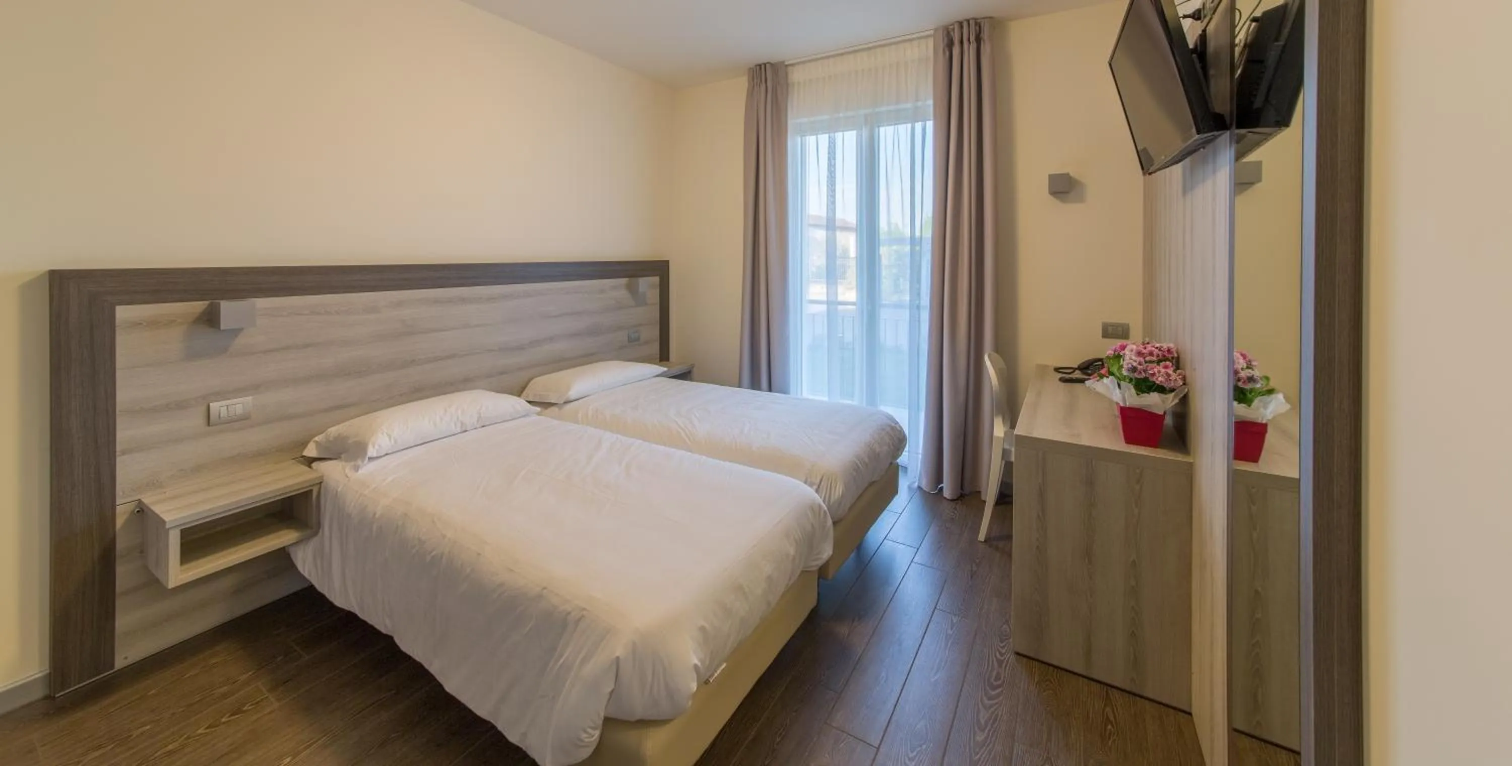 Bed in Hotel Panineria Colombera Rossa