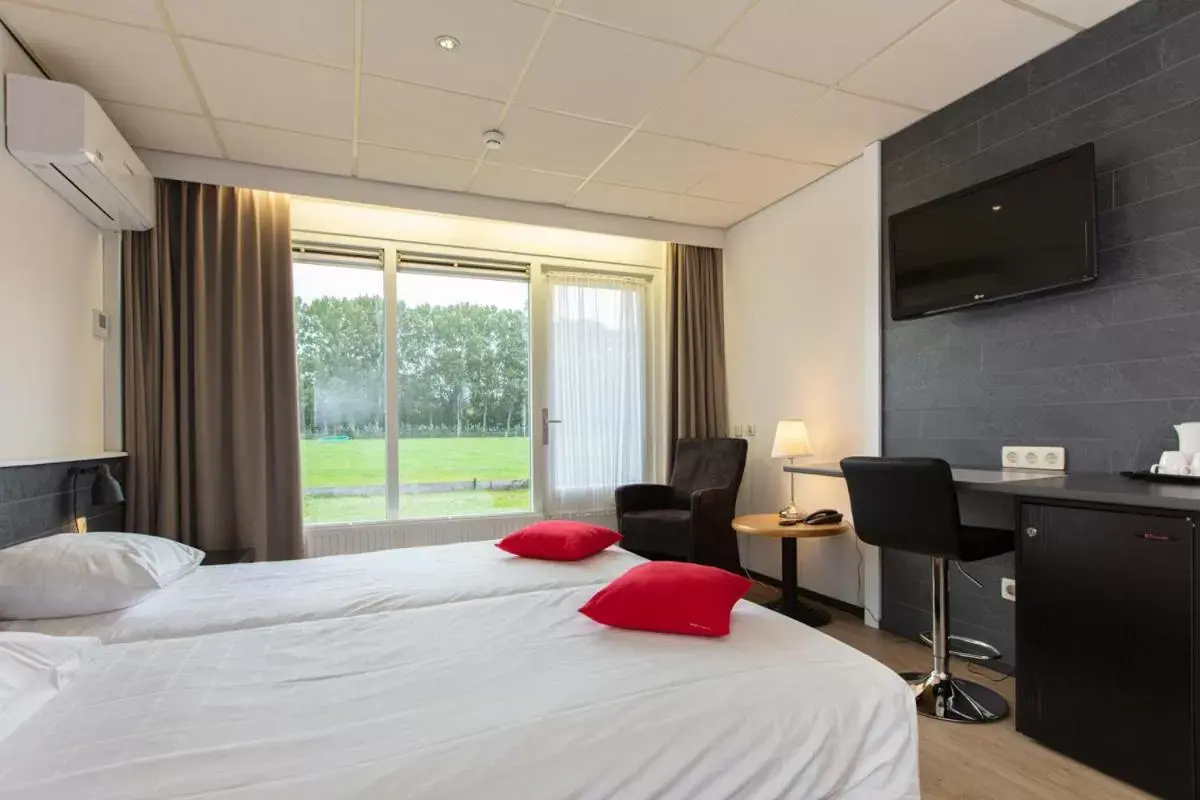 Photo of the whole room in Aparthotel Delden