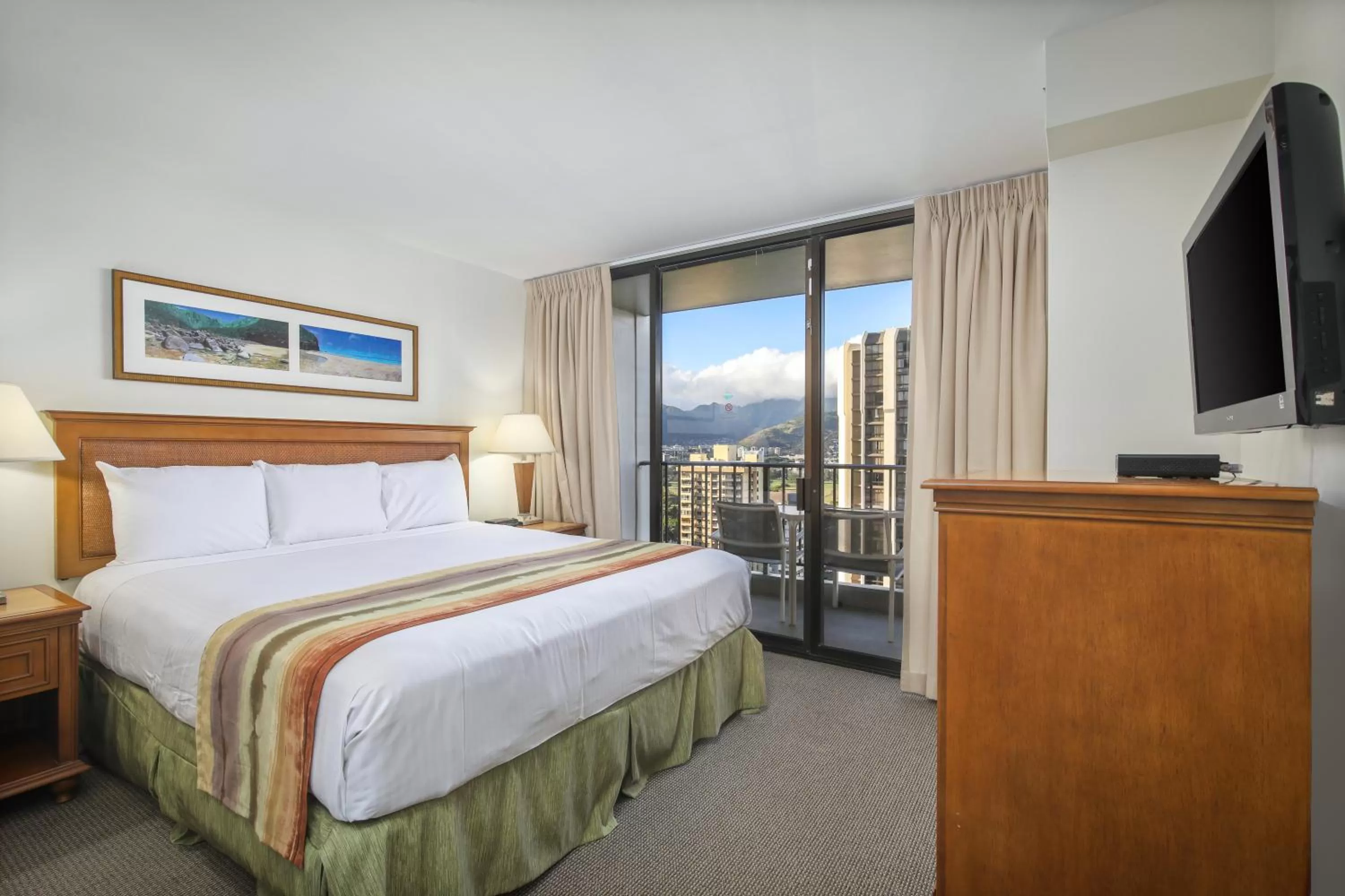 Bed in Aston Waikiki Sunset