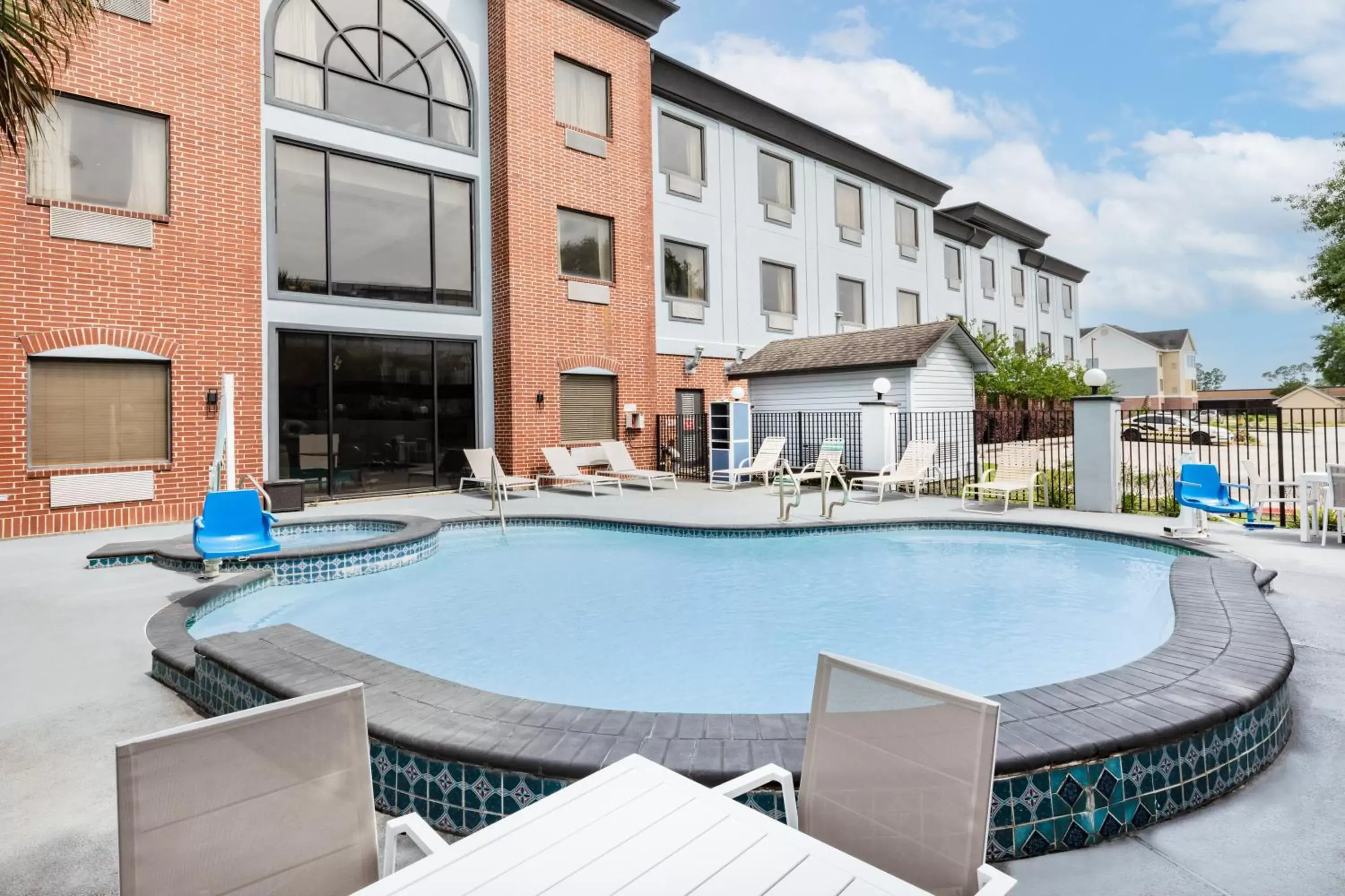 Swimming pool, Property Building in Wingate by Wyndham Houston Bush Intercontinental Airport