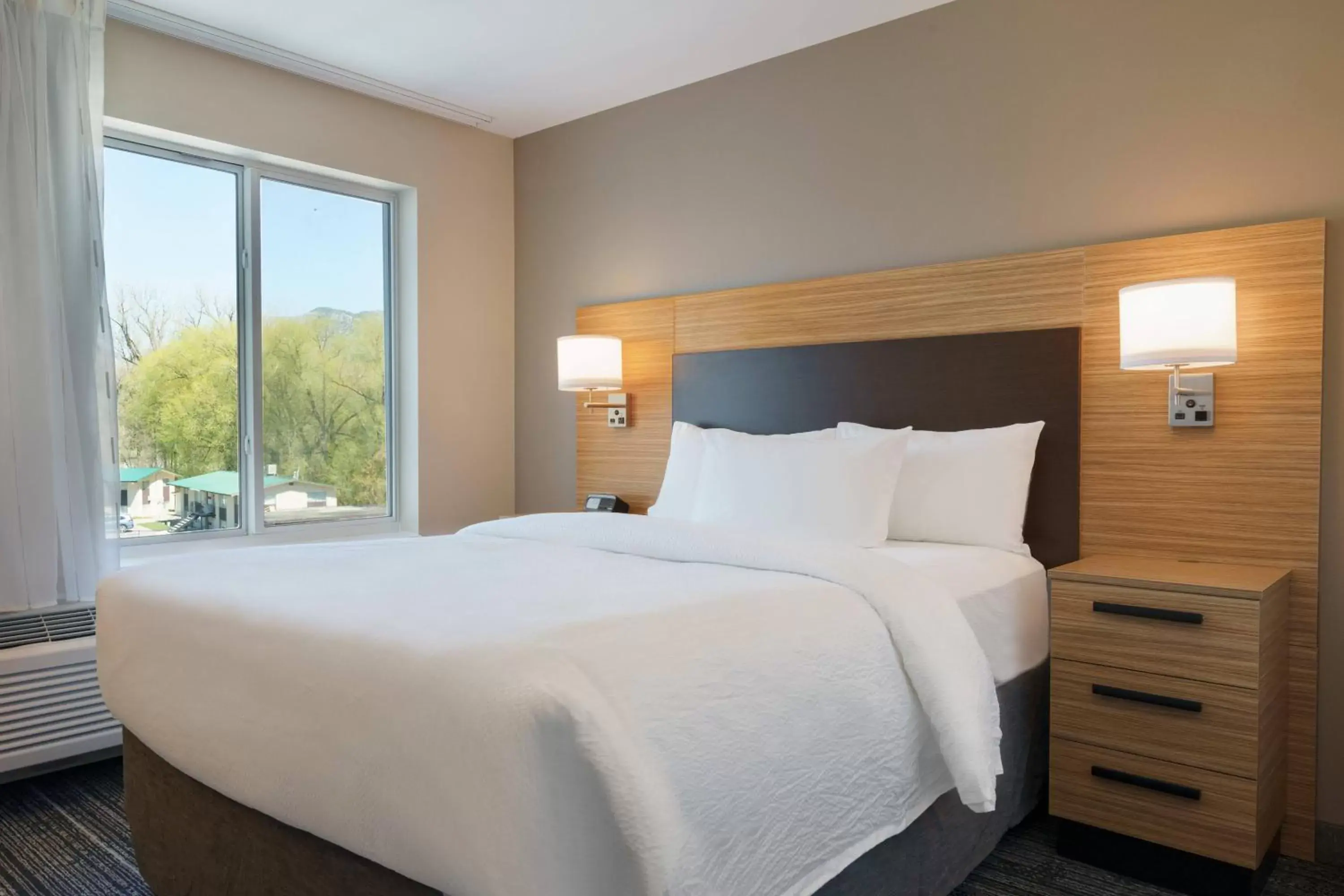 Bedroom, Bed in TownePlace Suites by Marriott Logan