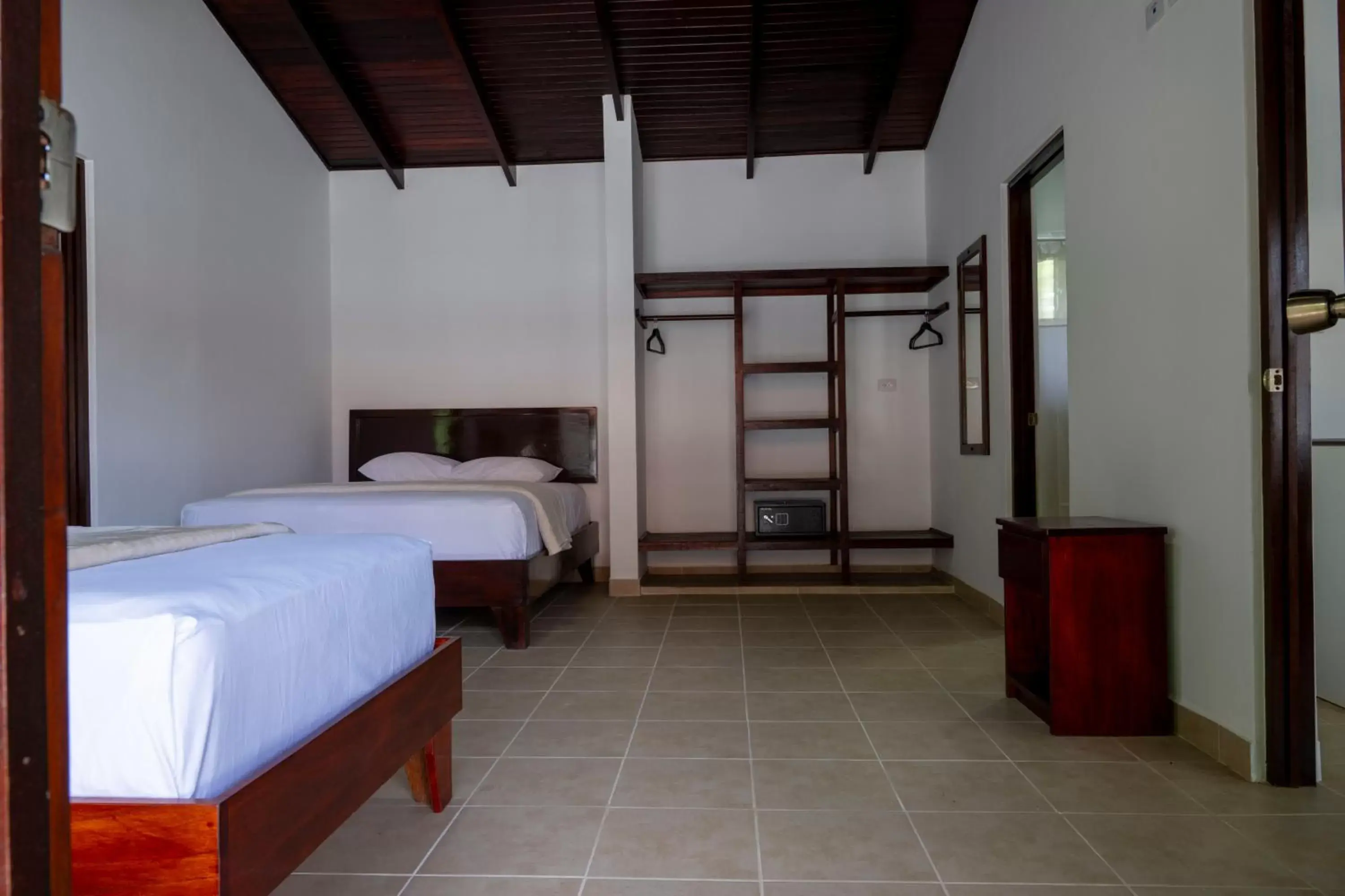 Bedroom in Fuego del Sol Beachfront Hotel