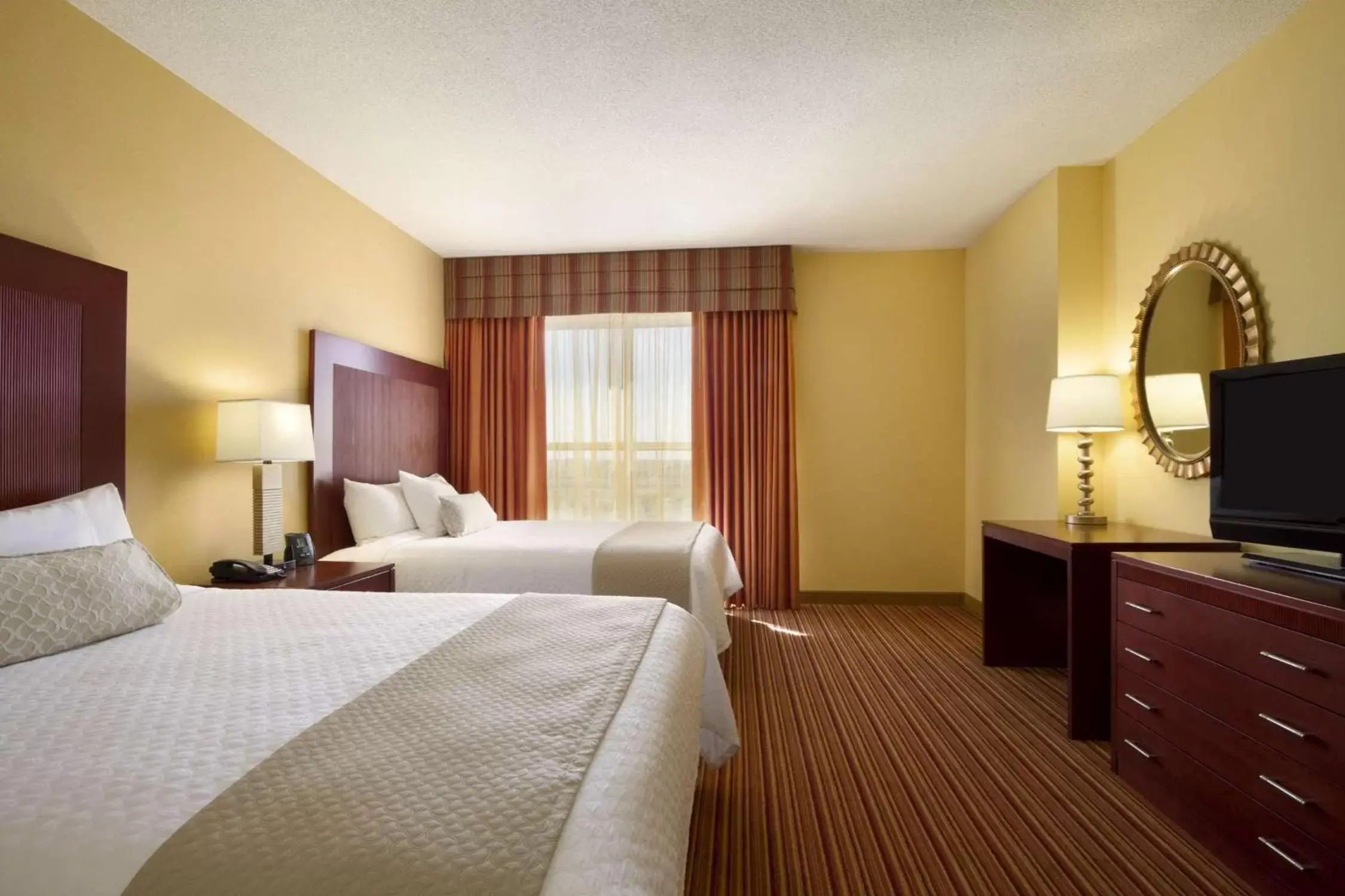 Bed in Embassy Suites by Hilton Norman Hotel & Conference Center