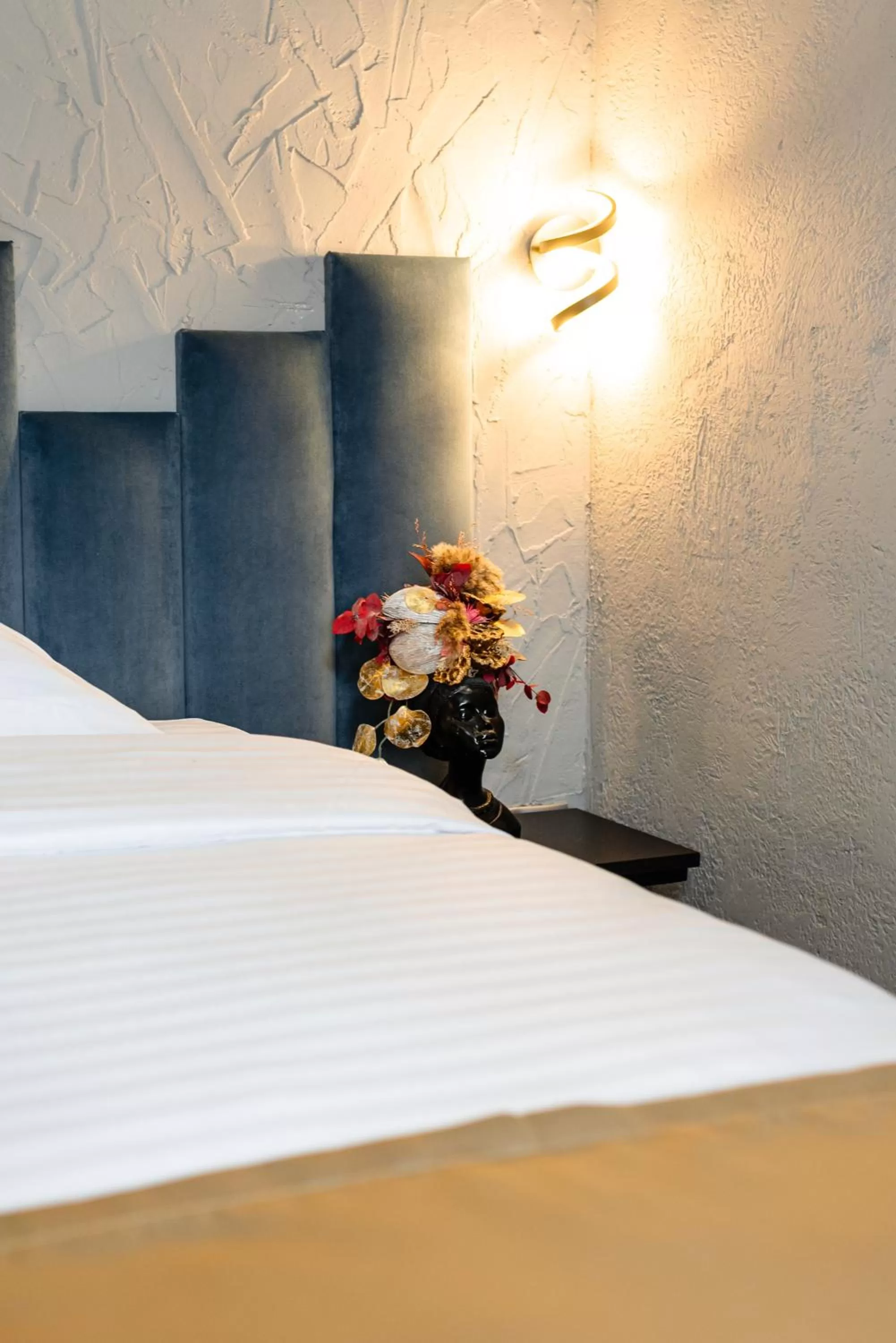 Decorative detail, Bed in Palace Bulevard Inn