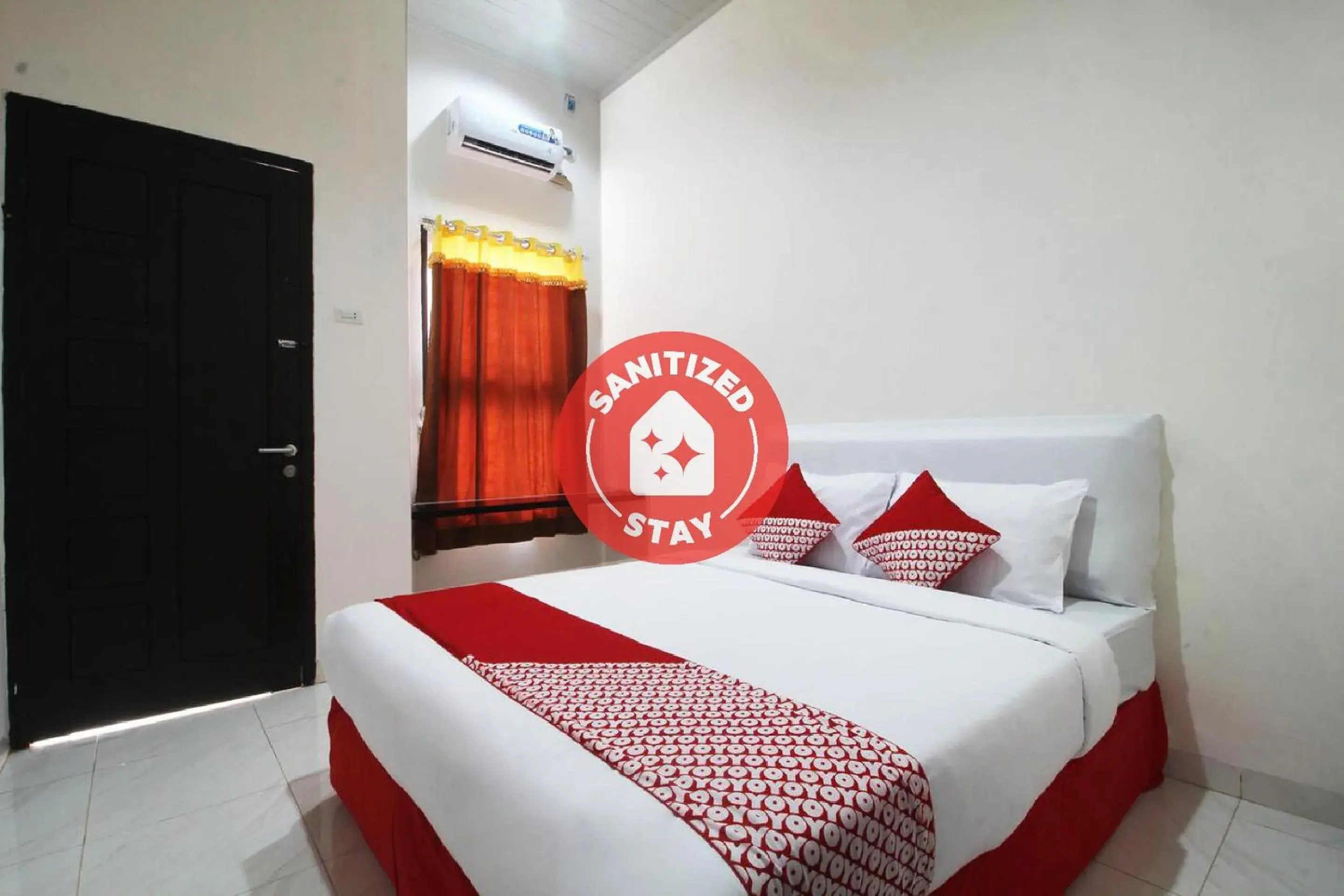 Bedroom in OYO 1678 Jati Exclusive Homestay