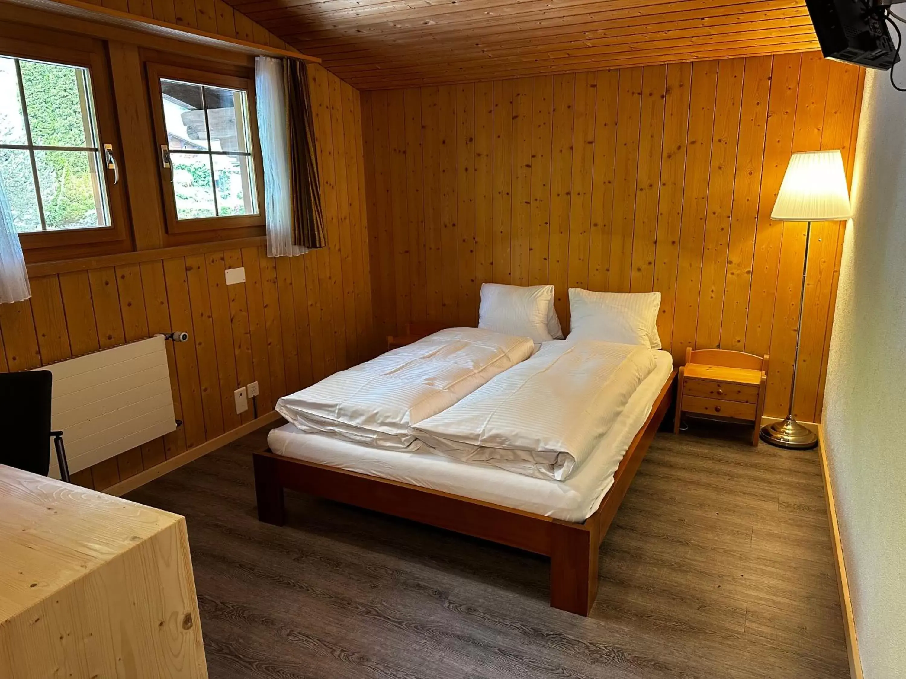 Photo of the whole room, Bed in Hotel Lindenhof by Crossworld AG