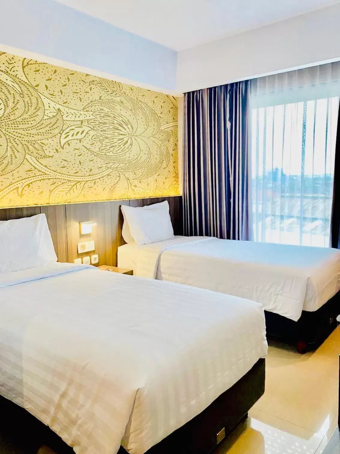 Bed in Unisi Hotel Malioboro - Jogja Syariah