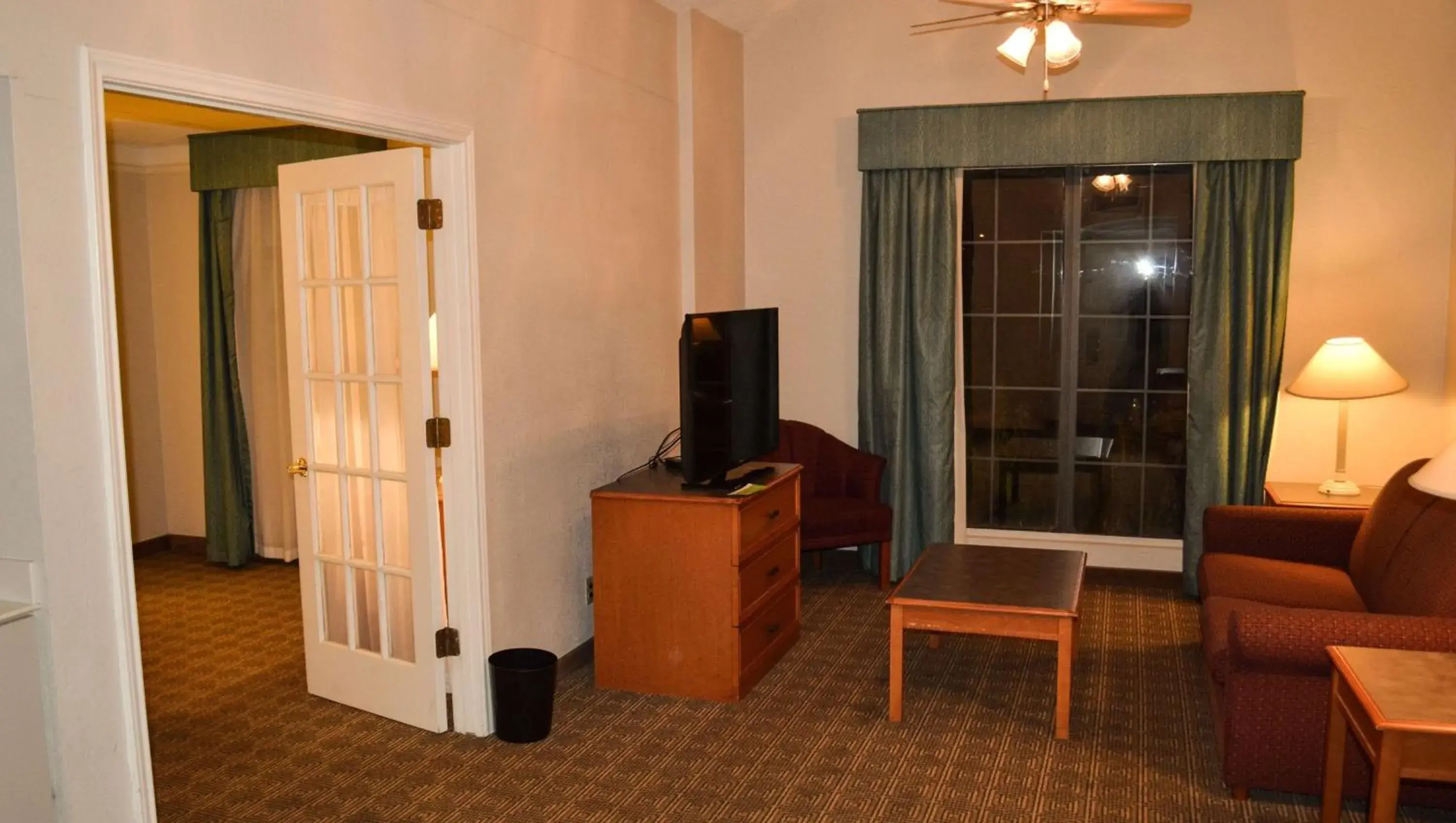 Photo of the whole room, TV/Entertainment Center in Magnuson Hotel Texarkana