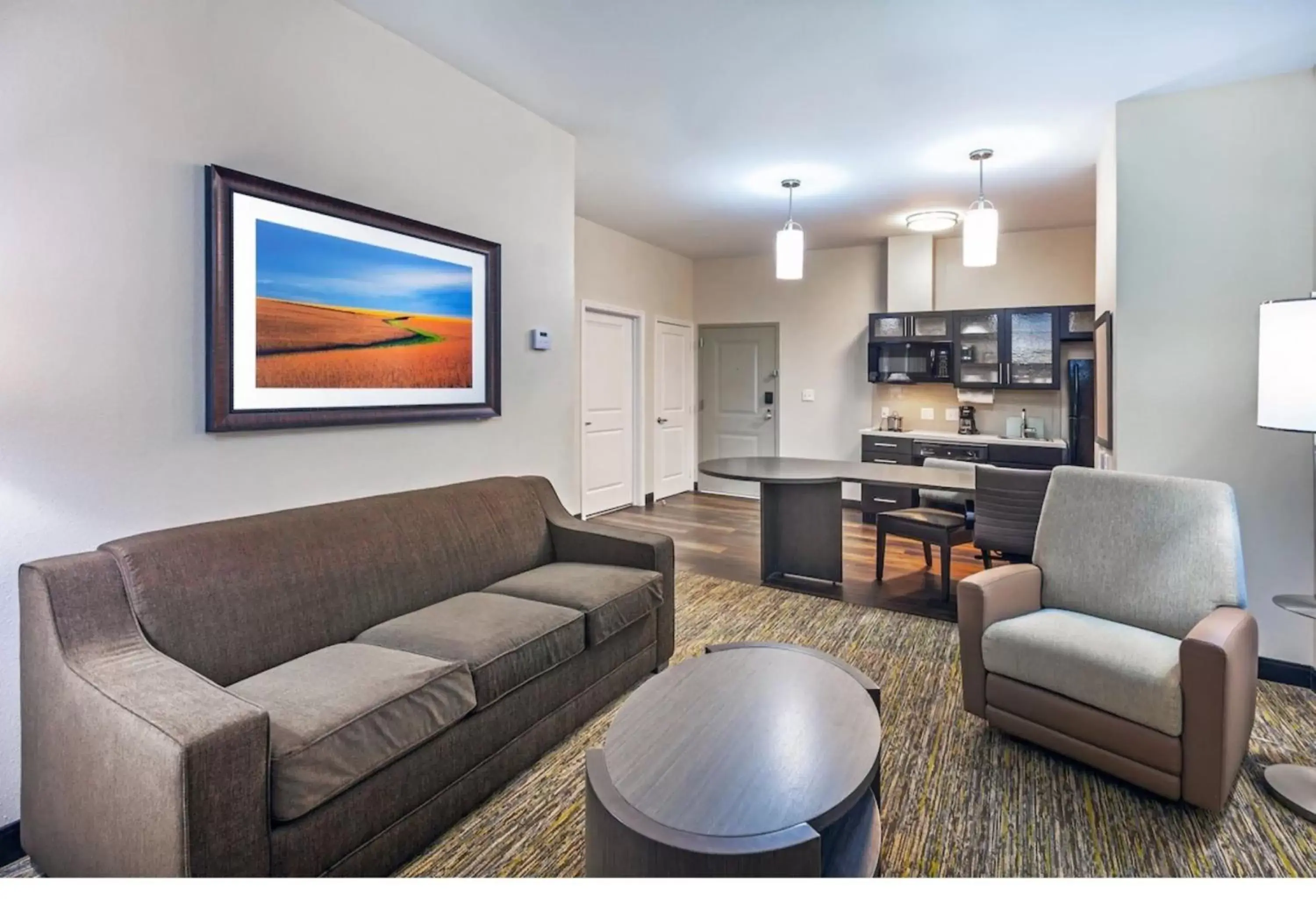 Photo of the whole room, Seating Area in Candlewood Suites Midland, an IHG Hotel