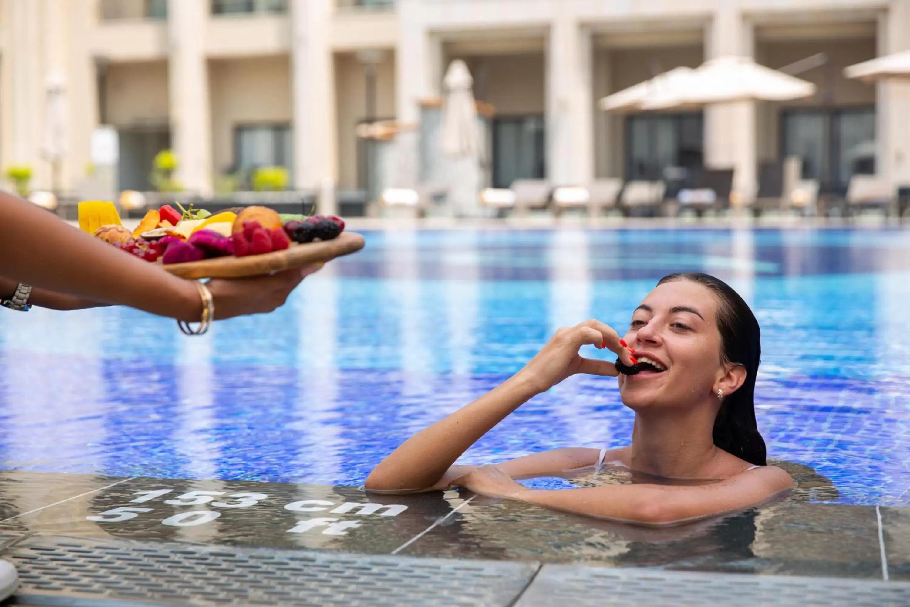 People, Swimming Pool in Triumph Luxury Hotel