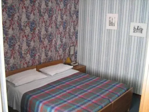 Bed in Hotel Da Cesare