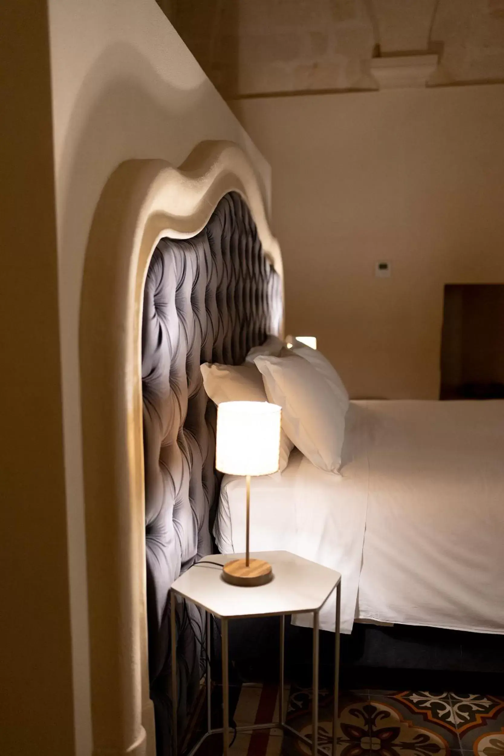 Bed in Palazzo Del Duca Luxury Hotel & Restaurant