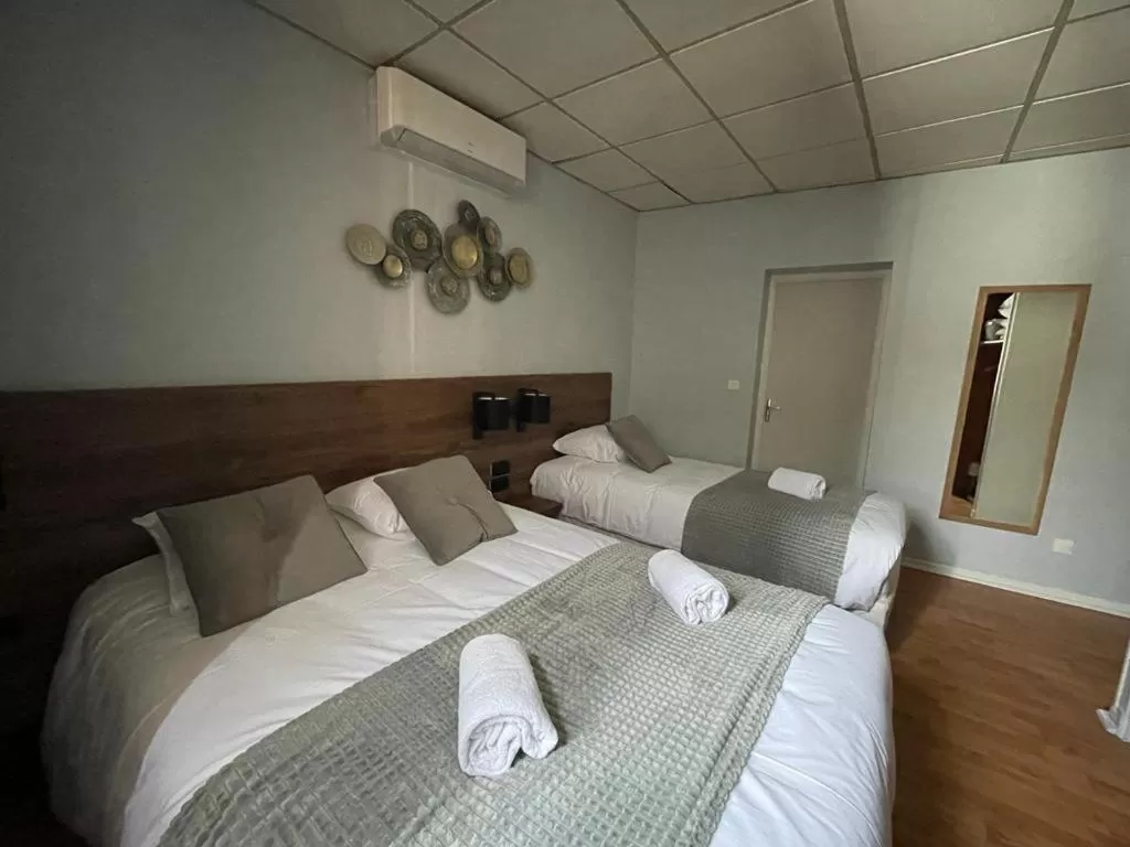 Bed in Hotel Le Rochegude