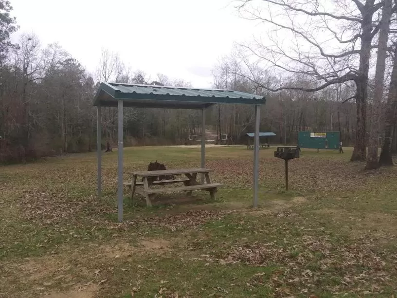 Property building in Whispering Creek Lodging & RV Resort