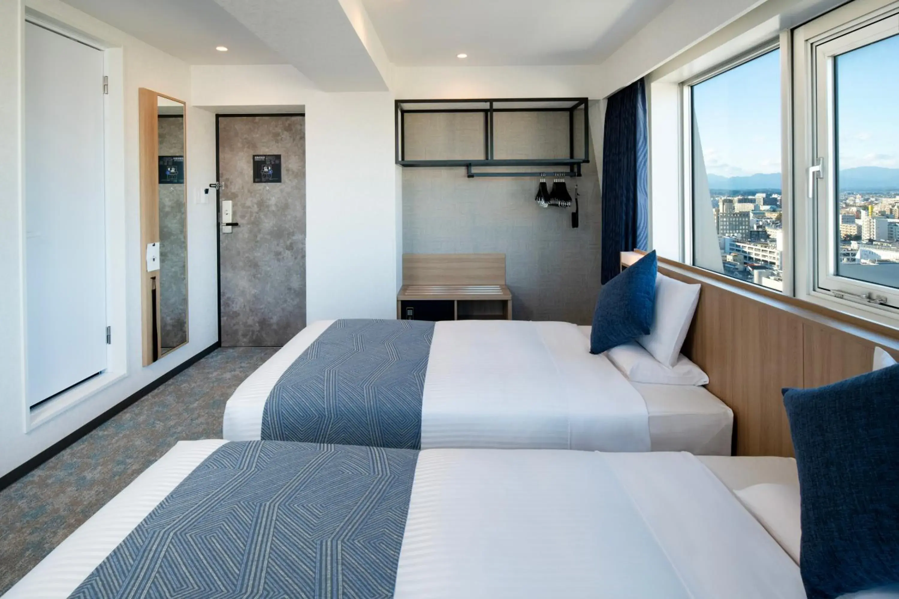 Photo of the whole room, Bed in Hotel Sky Tower Miyazaki Ekimae