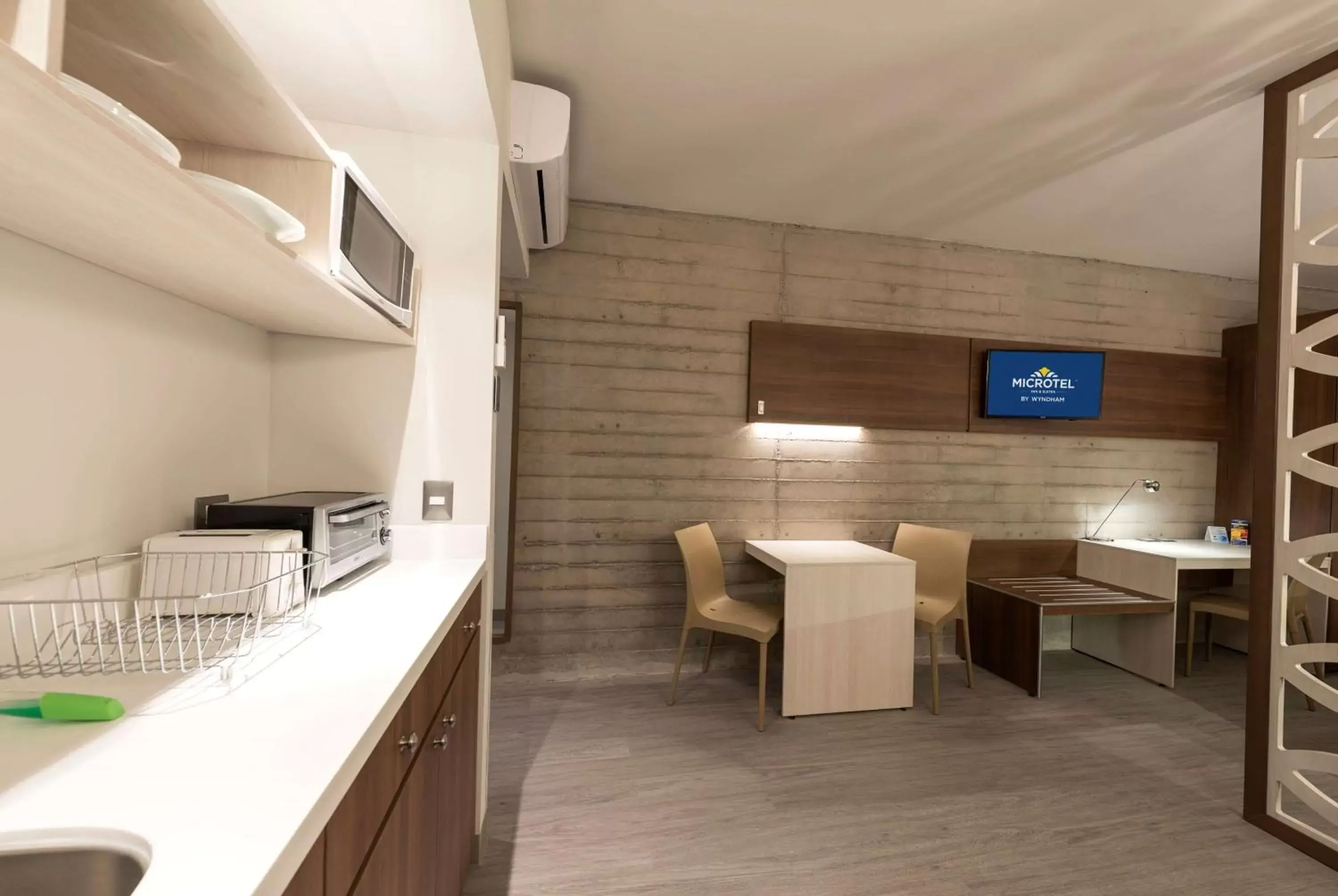 Photo of the whole room, Kitchen/Kitchenette in Microtel Inn & Suites by Wyndham Guadalajara Sur