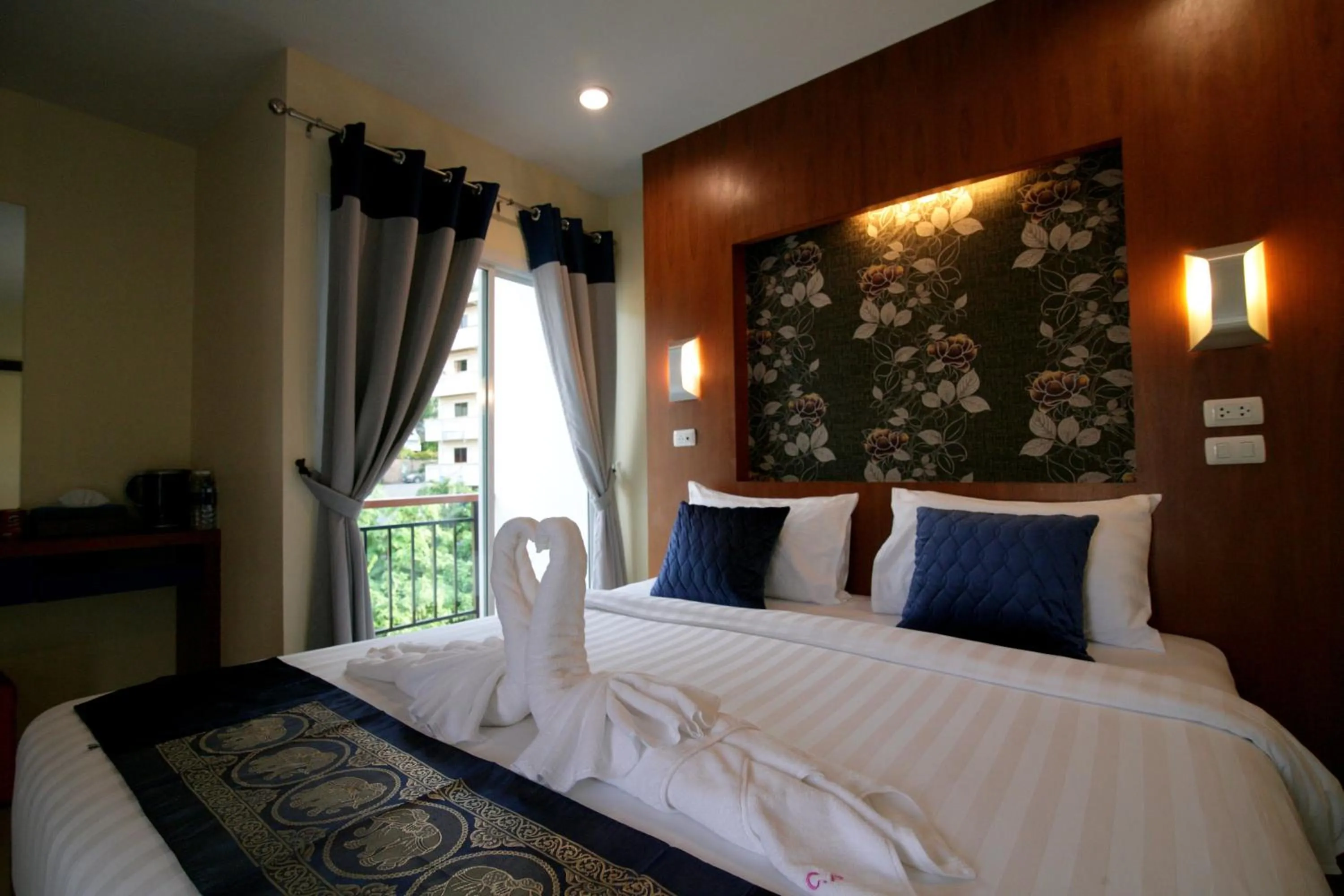 Bed in Calypso Patong Hotel