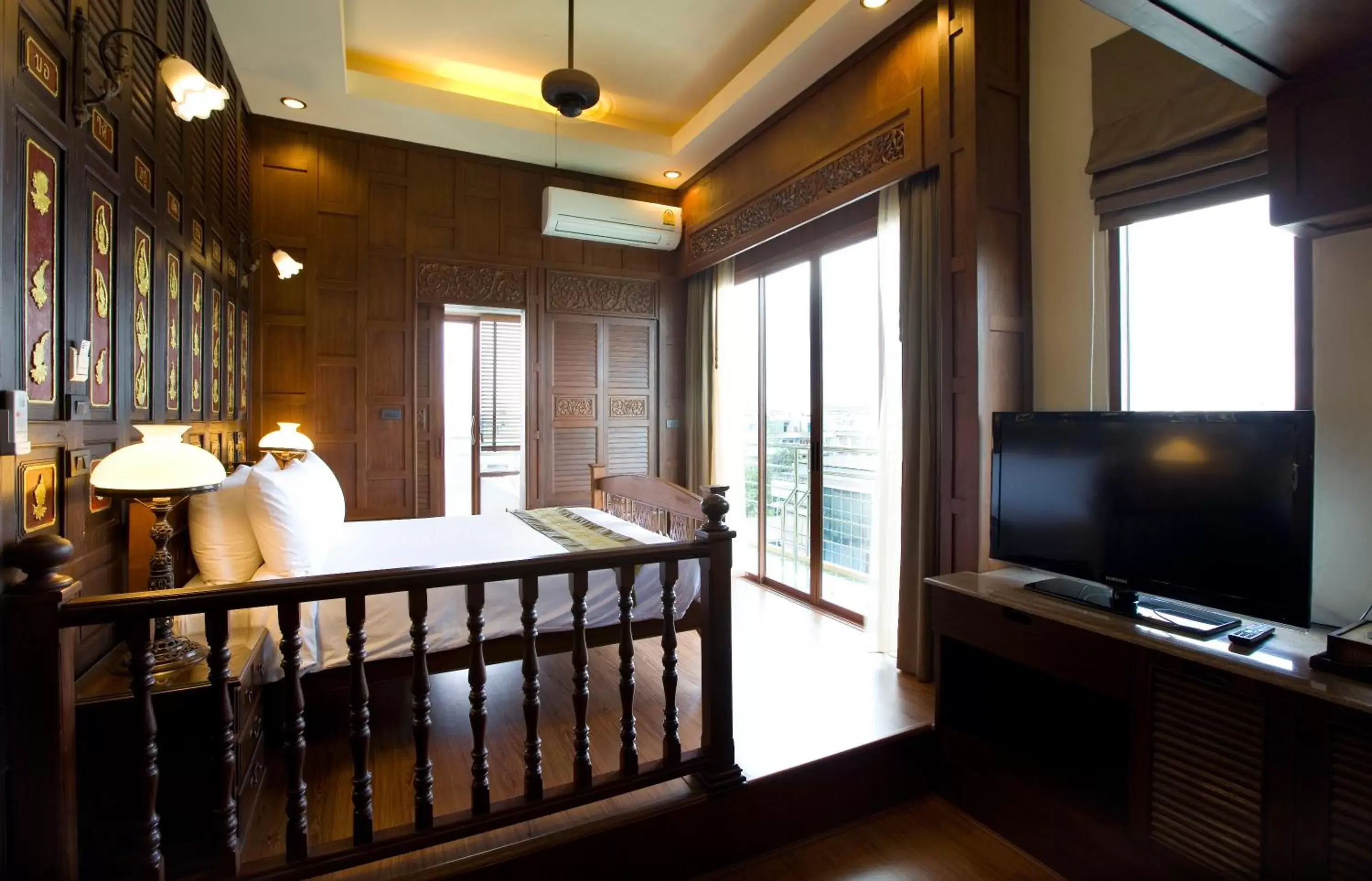 Bedroom, TV/Entertainment Center in Lamphu Tree House Boutique Hotel