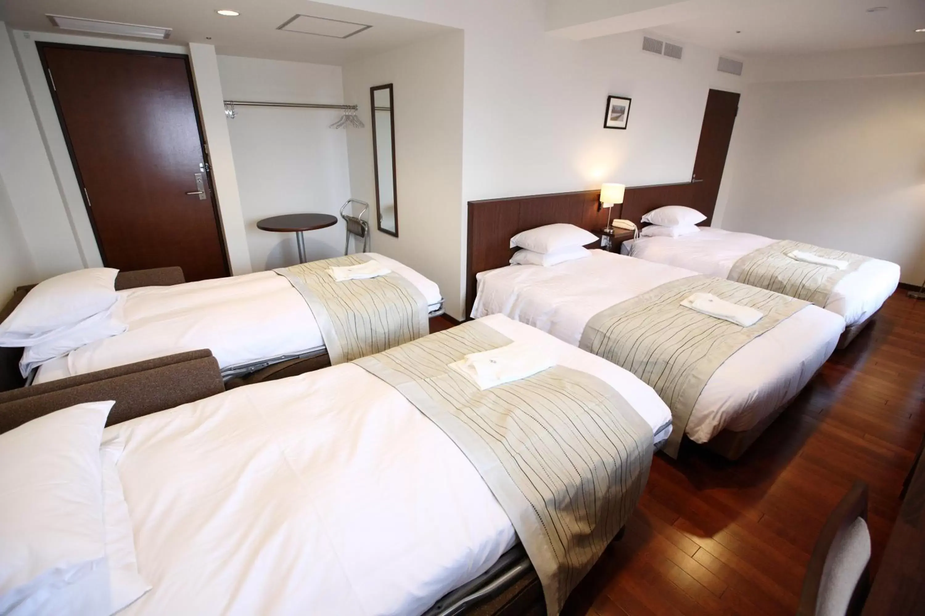 Bed in Sutton Hotel Hakata City