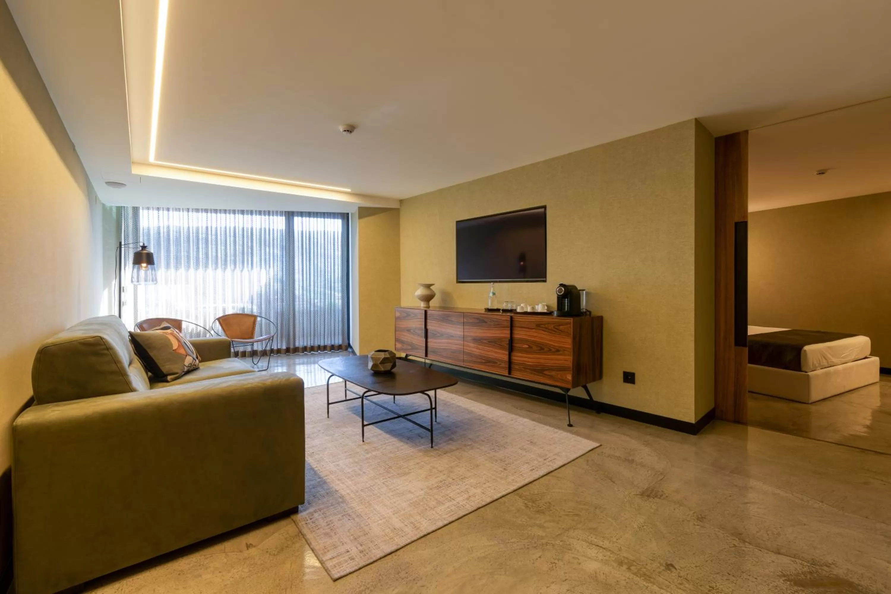 Communal lounge/ TV room in Well Hotel & Spa