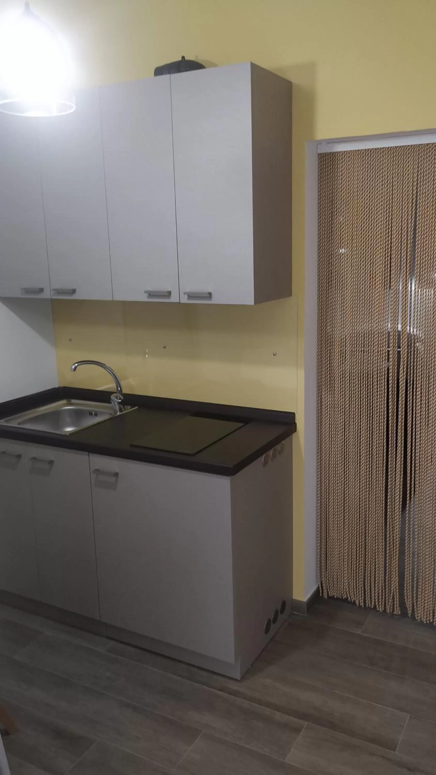 Kitchen or kitchenette in Comeacasa B&B