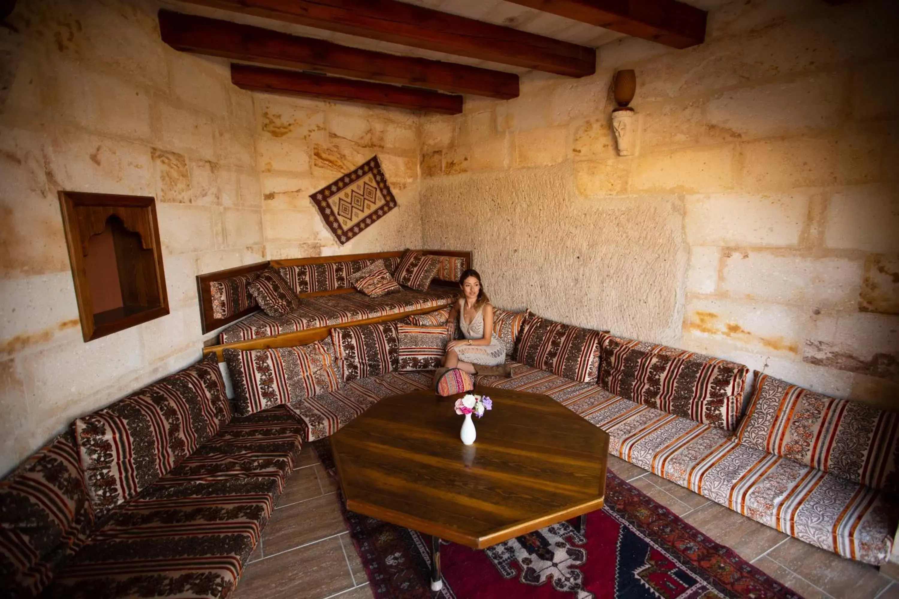 Seating area in Stone House Cave Hotel