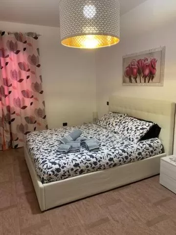 Bed in B & B Villa Fiorella