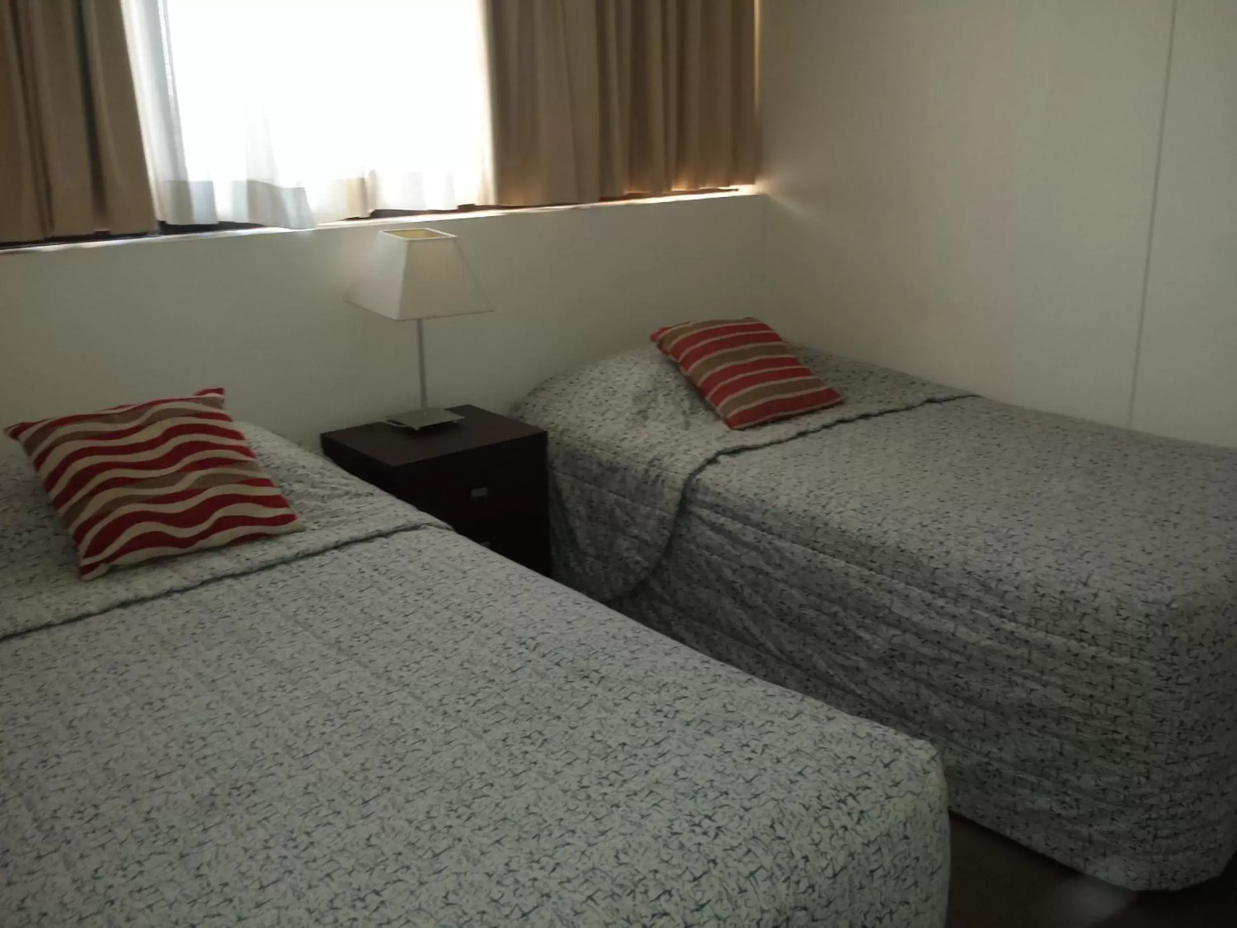 Bed in Kirribilli Apartments