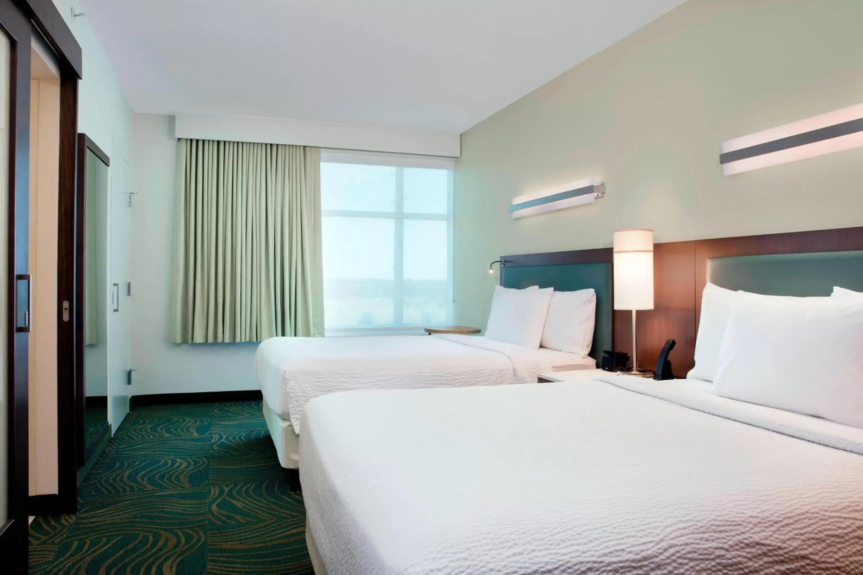 Bedroom, Bed in SpringHill Suites by Marriott Orlando at FLAMINGO CROSSINGS Town Center-Western Entrance
