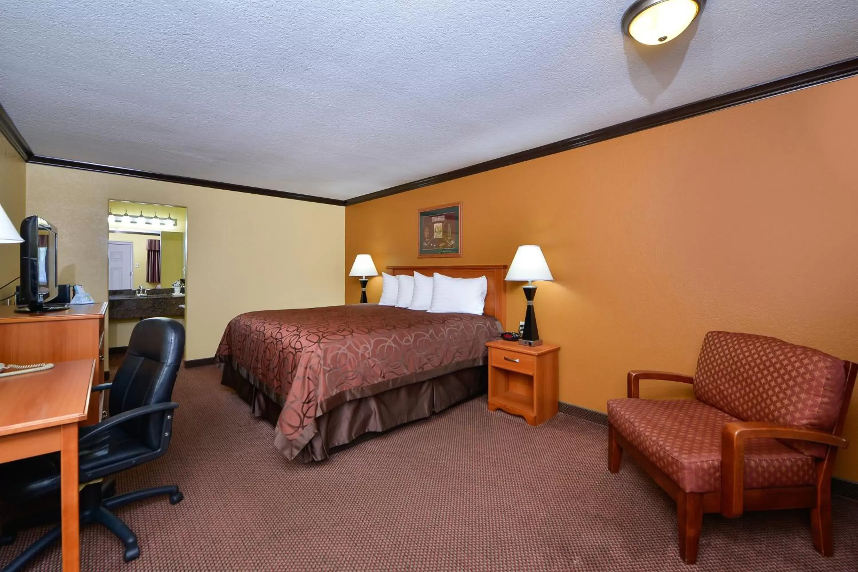 Bedroom, Bed in Americas Best Value Inn Center