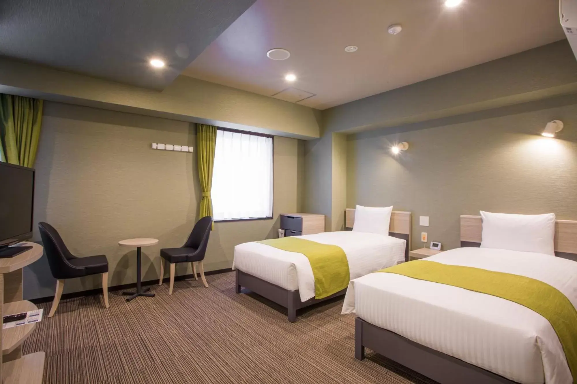 Bed in Kuretake Inn Nagoya Hisayaodori Bed in Kuretake Inn Nagoya Hisayaodori