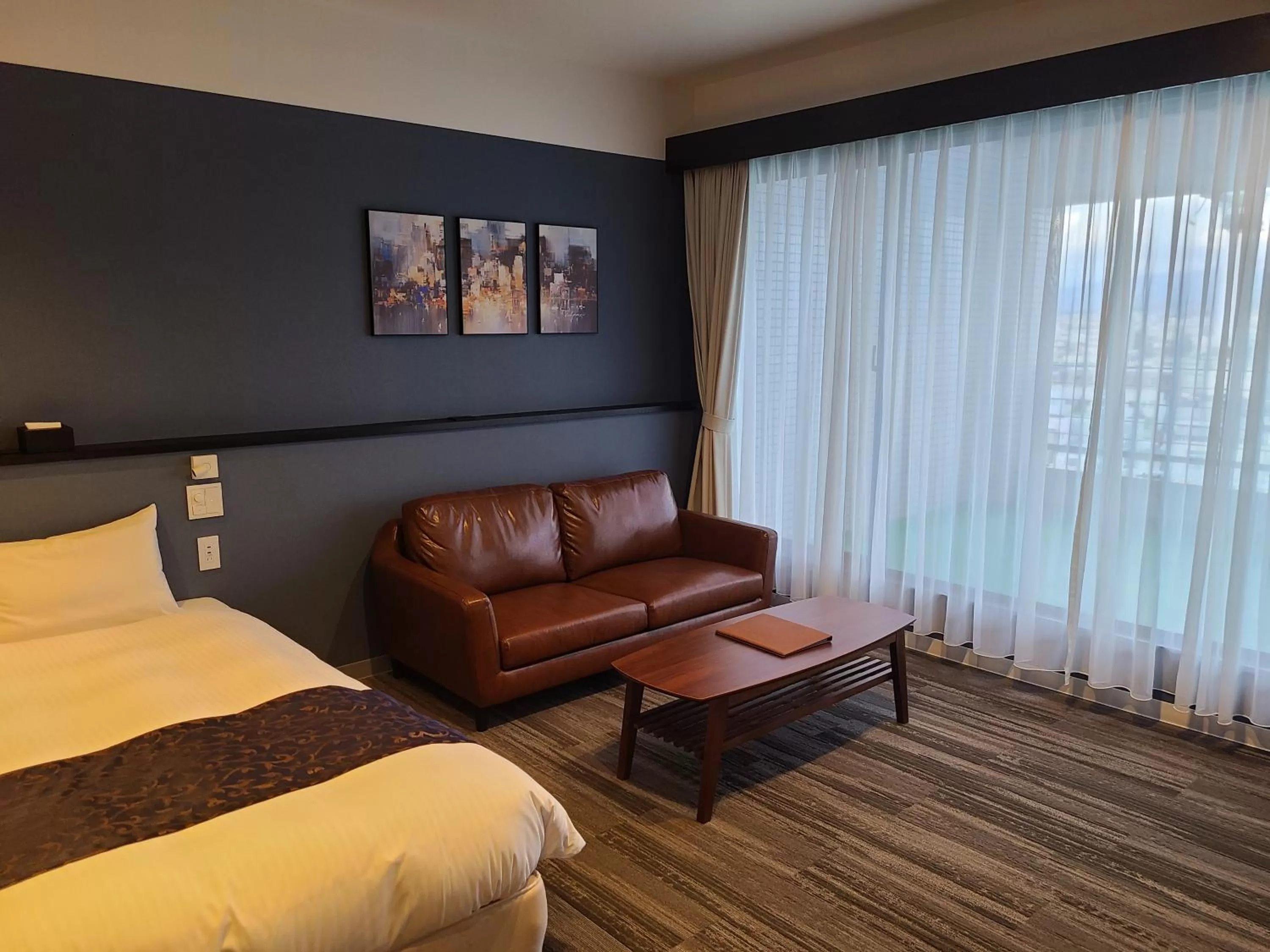 Living room, Bed in LC Goryokaku Hotel