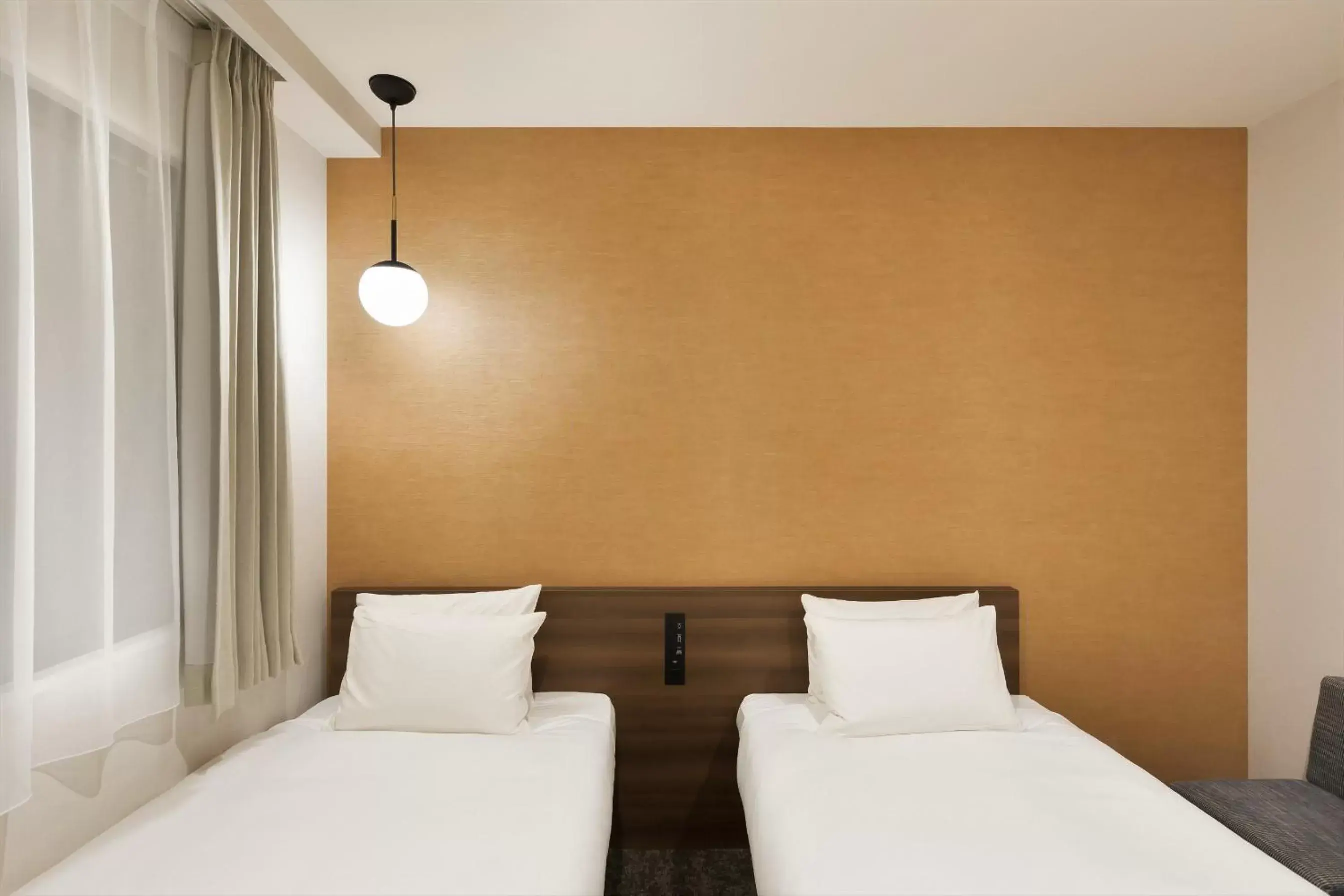 Bed in M's Hotel Sanjo Omiya