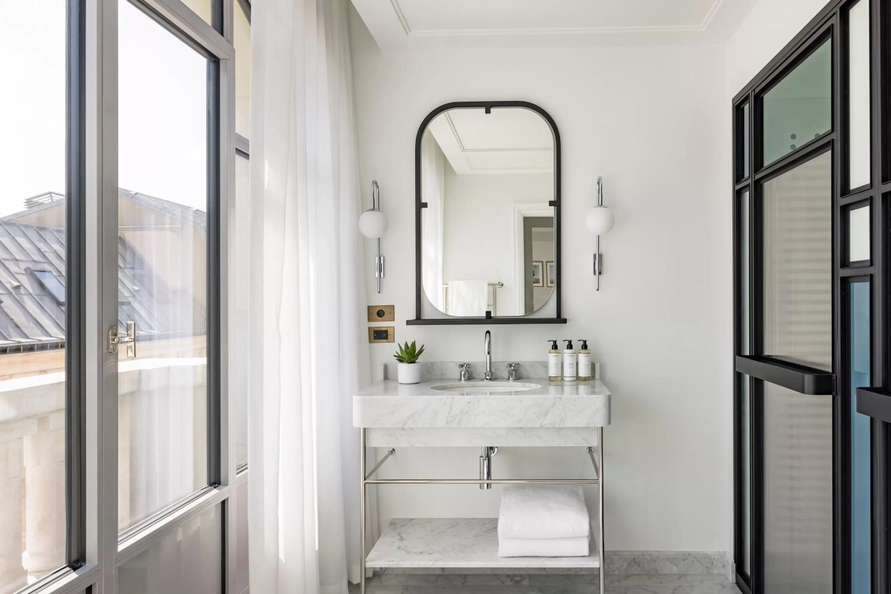 Bathroom in Kimpton - St Honoré Paris by IHG